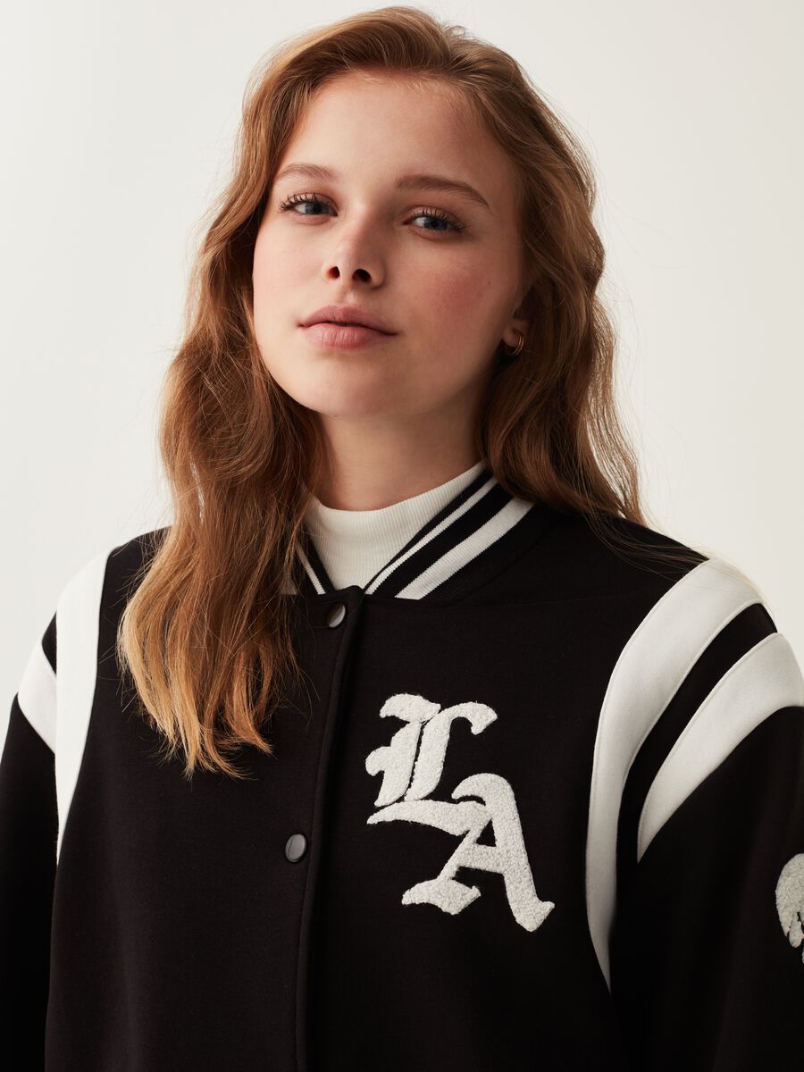 Giacca bomber cropped in felpa_1