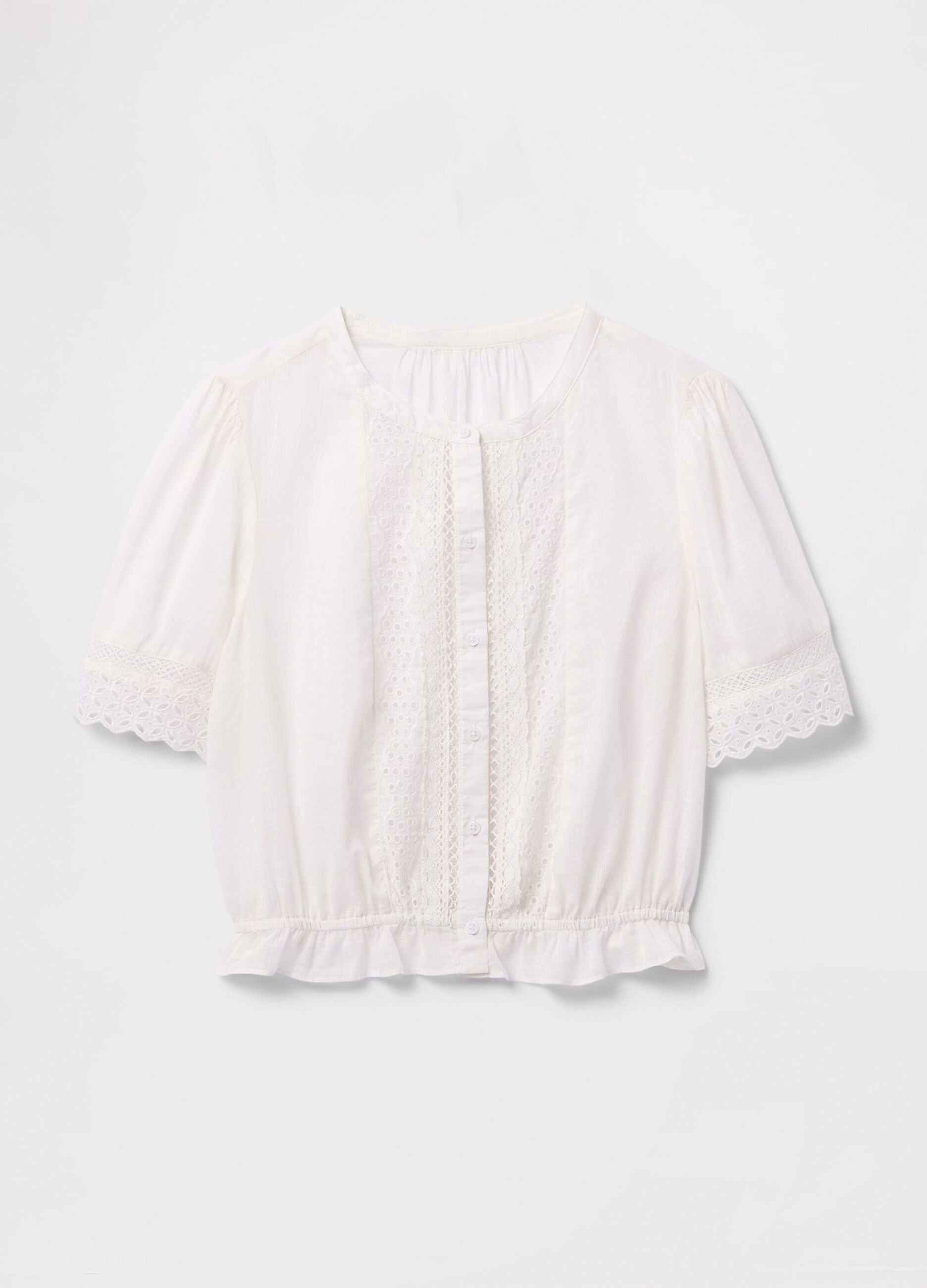 Blusa bianca ricamata in cotone