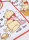 Twin-pack of white cotton mix bibs for newborn girls with Winnie the Pooh_1