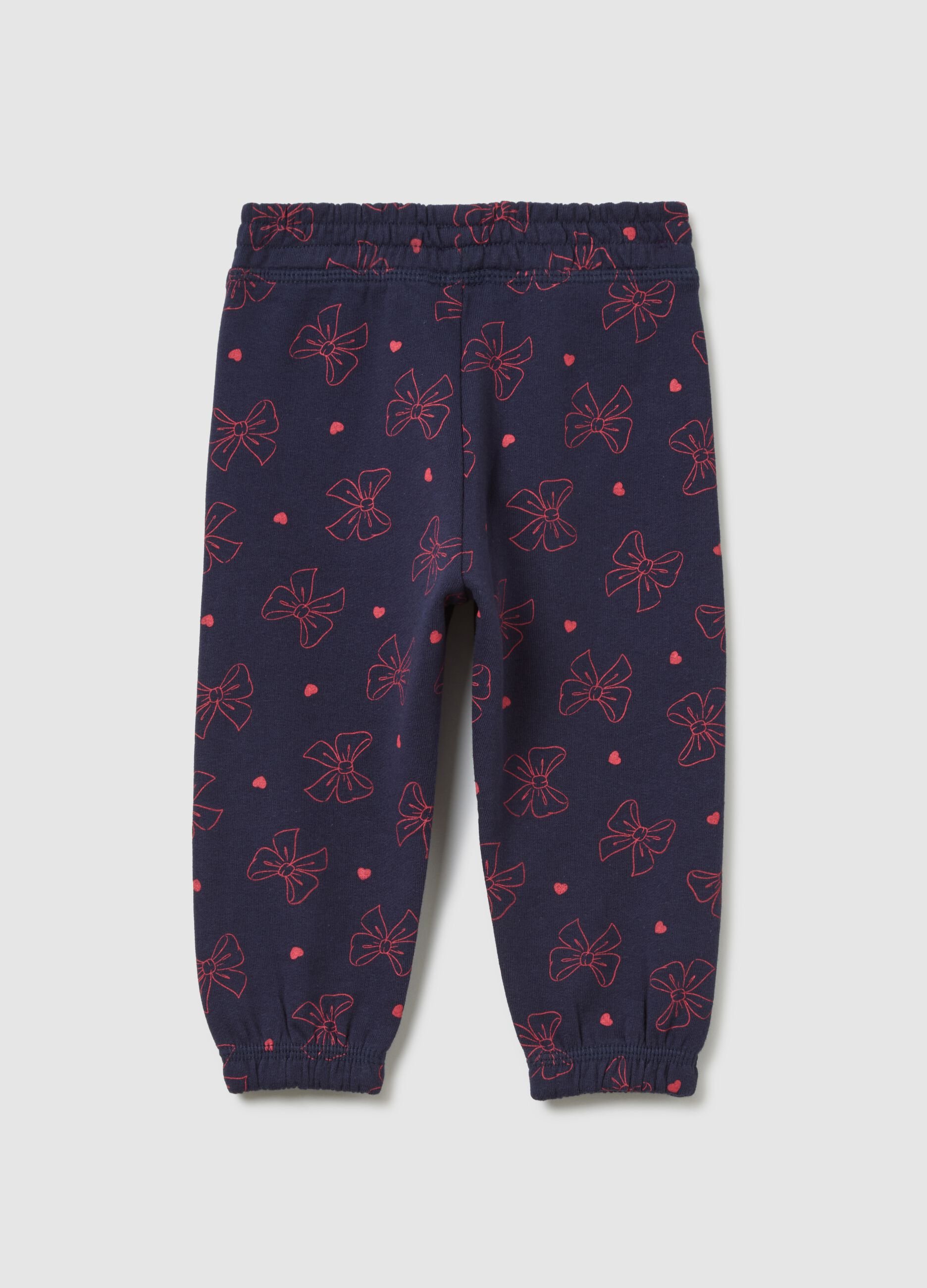 Blue leggings with bows and pink hearts