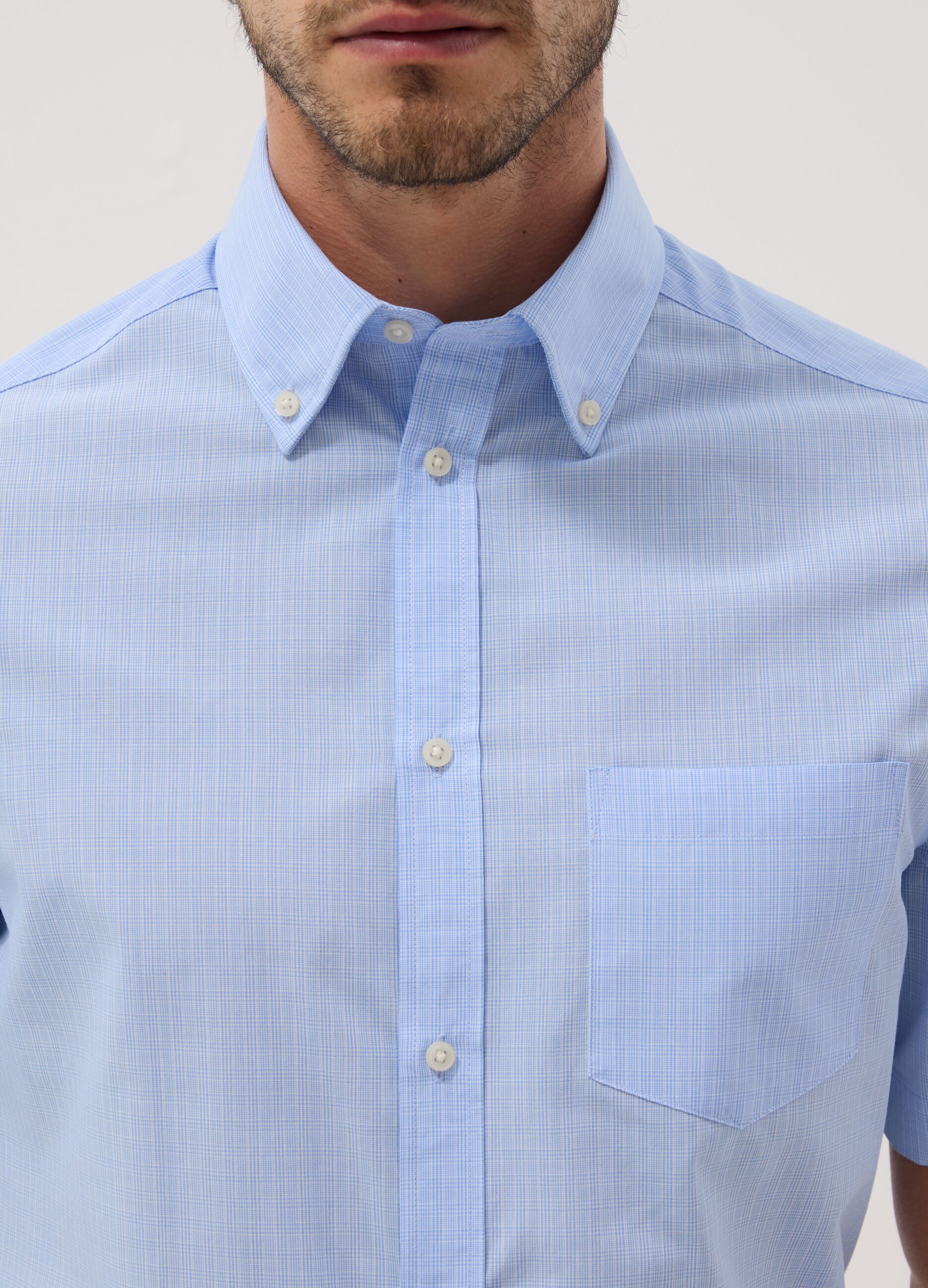 Light blue short-sleeve shirt with button-down collar