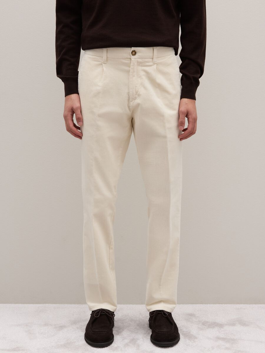 Beige cotton blend regular fit trousers_1