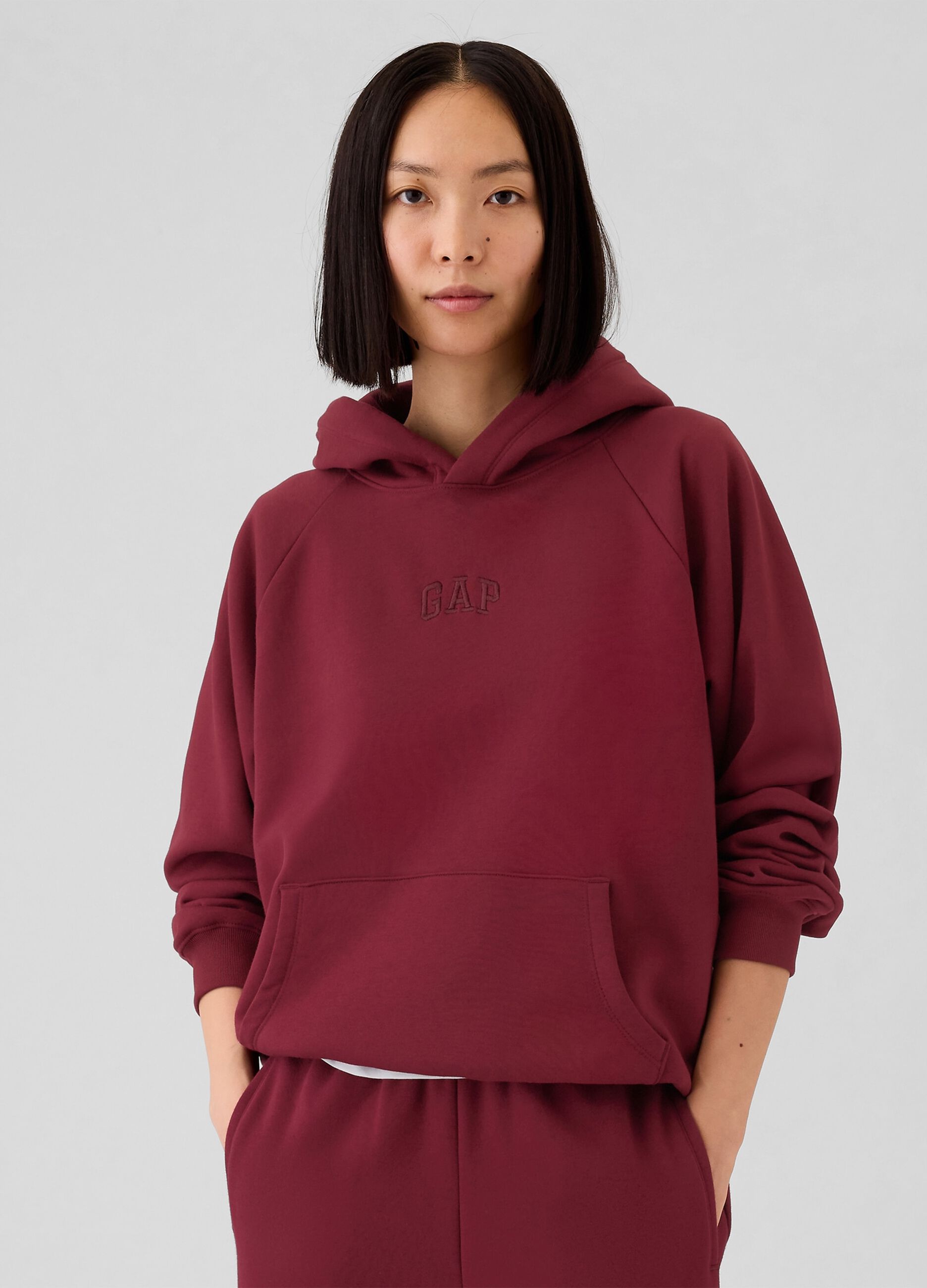 Sweatshirt with hood and raglan sleeves