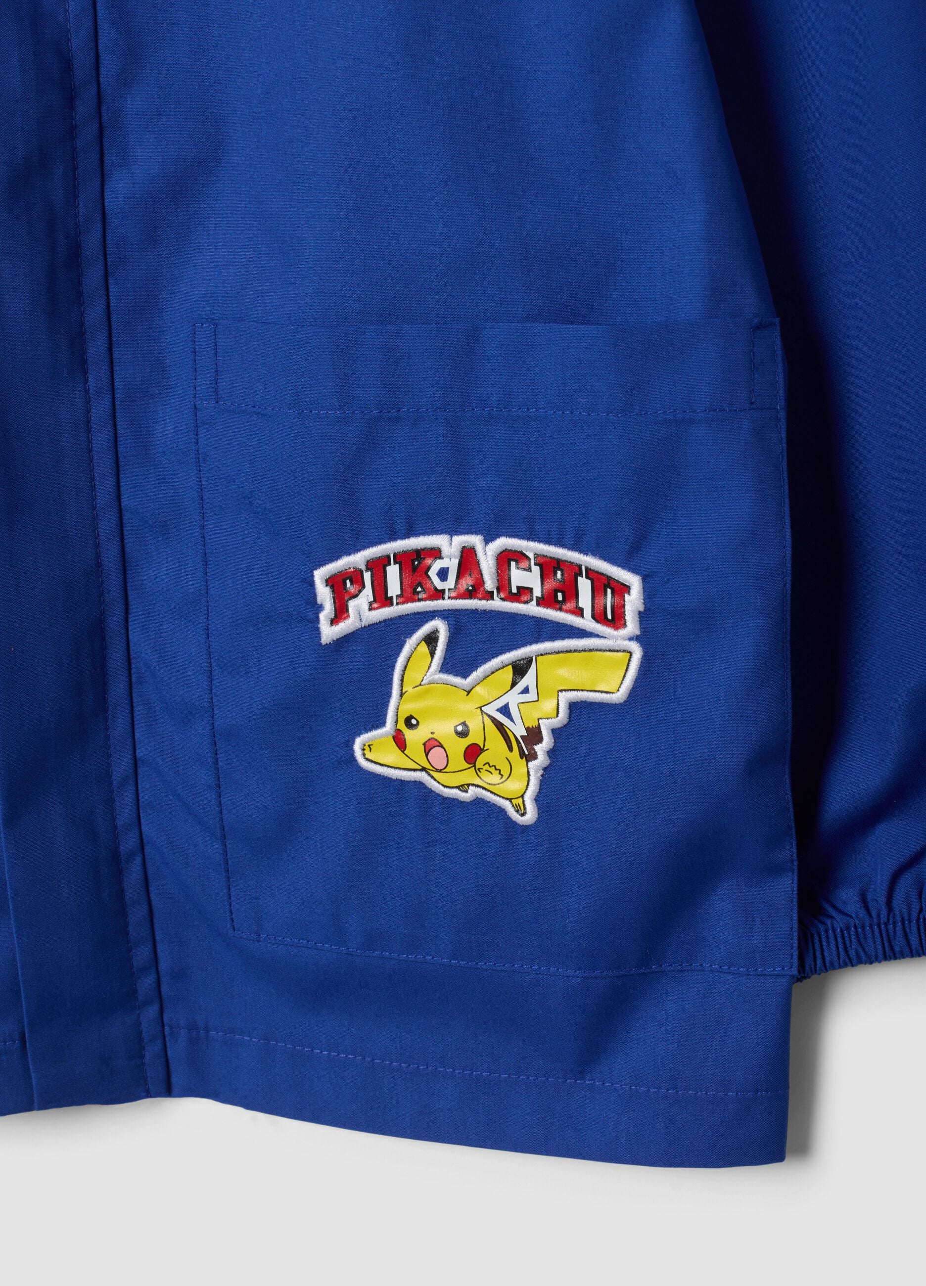 Blue kids&rsquo; school apron with zip and Pok&eacute;mon embroidery