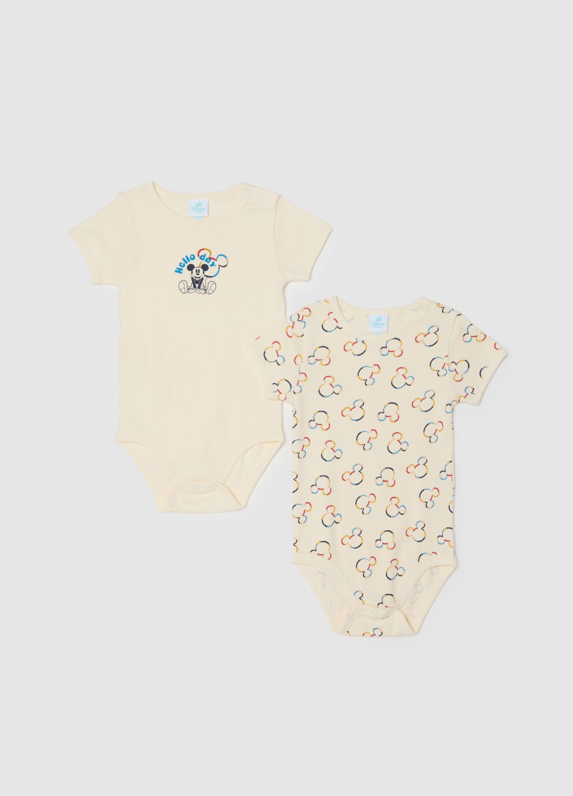 Two-pack infant beige bodysuits in pure cotton with prints