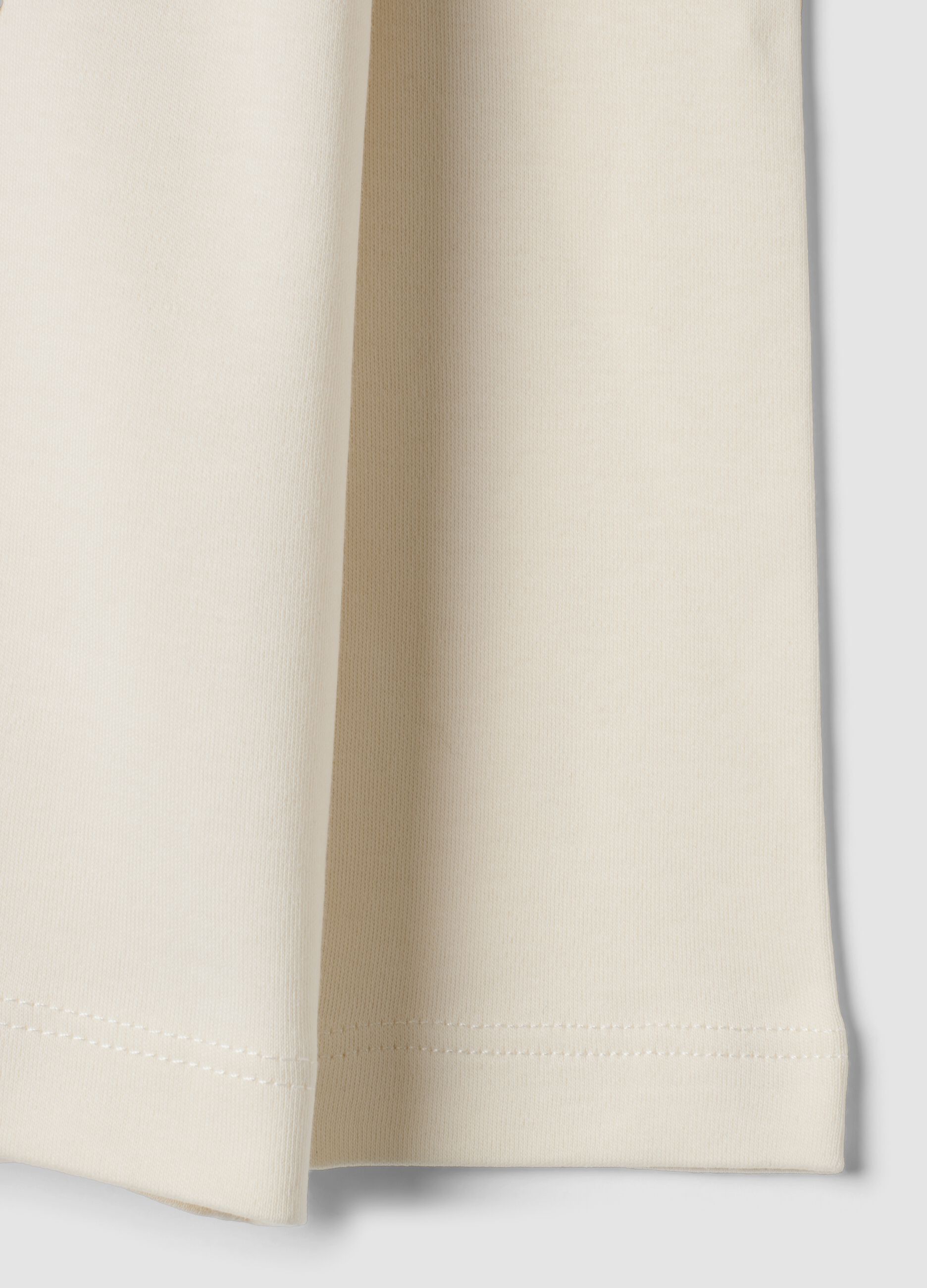 T-shirt bianca in puro cotone con girocollo e stampa lupo over fit