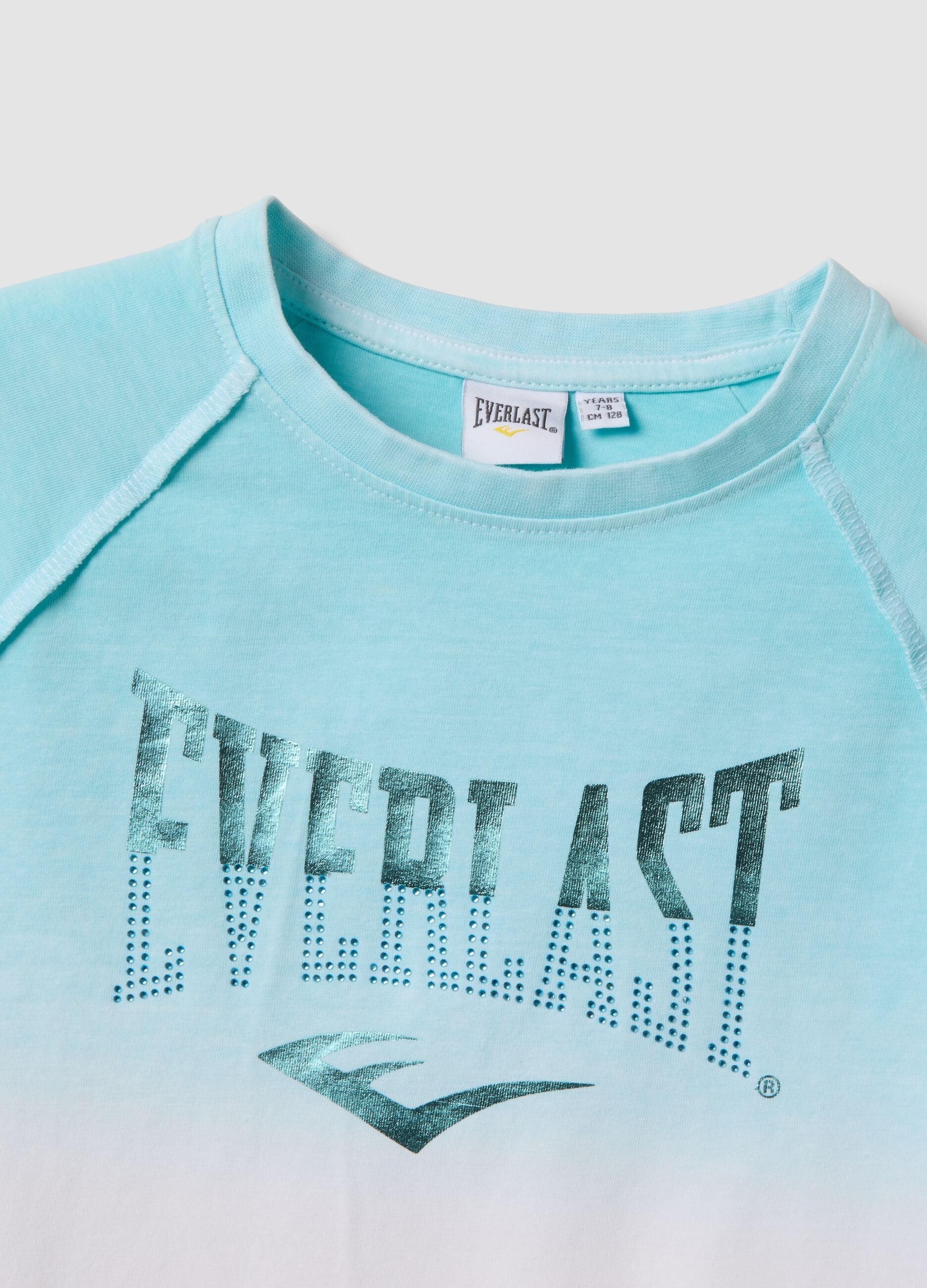 T-shirt azzurra in cotone elasticizzato a maniche corte per bambina regular fit