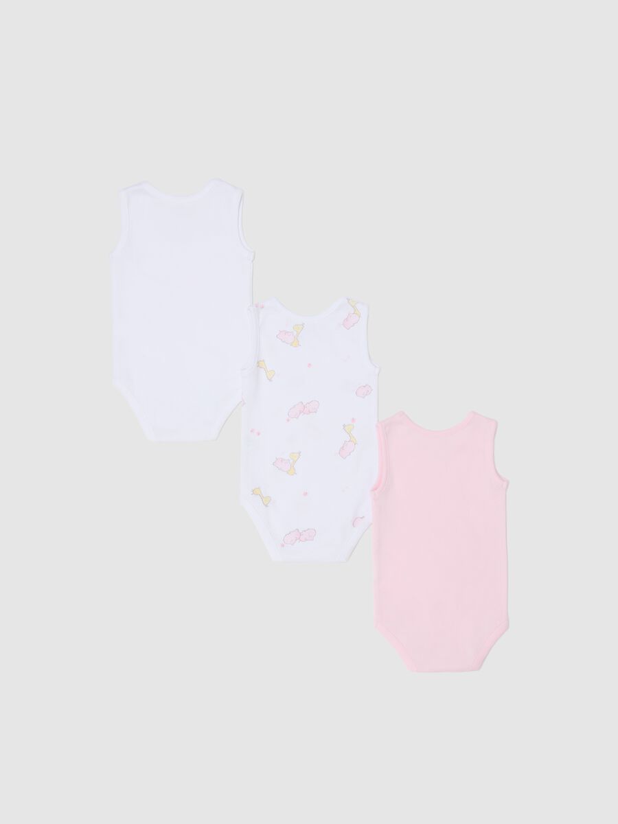Three-pack white and pink sleeveless bodysuits in organic cotton with print_1