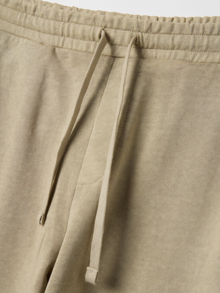 Oversize fit beige cotton blend trousers_1