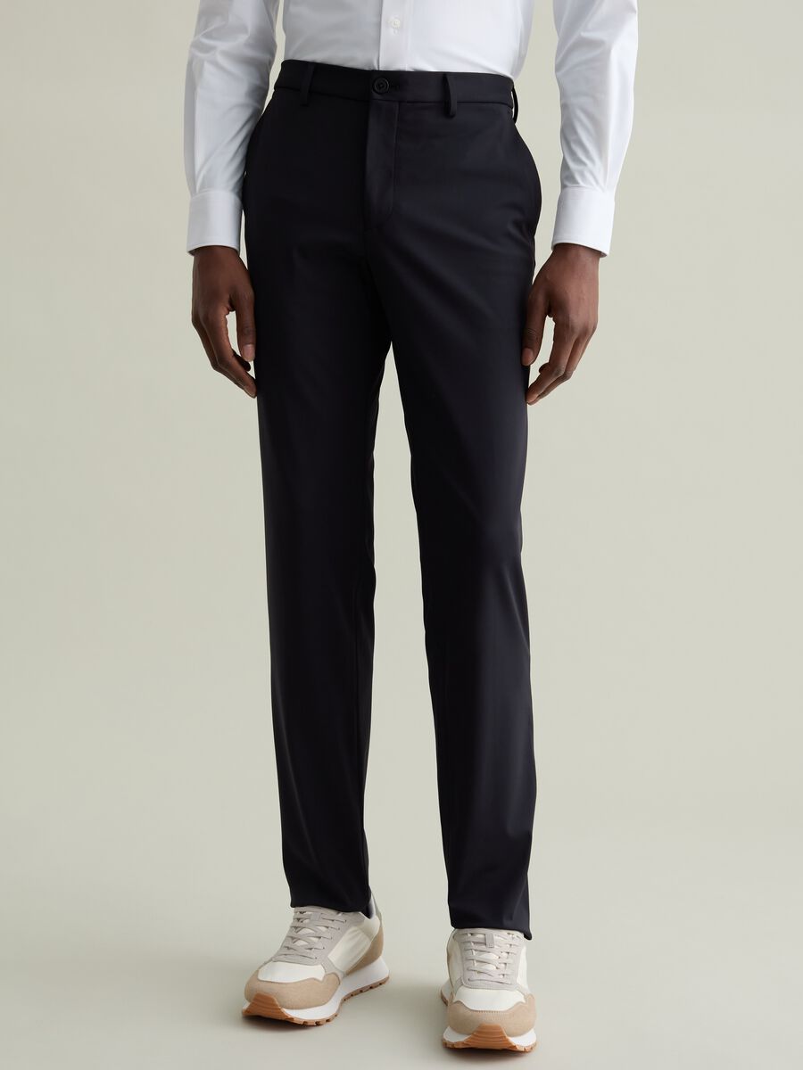Chino trousers in technical fabric_1