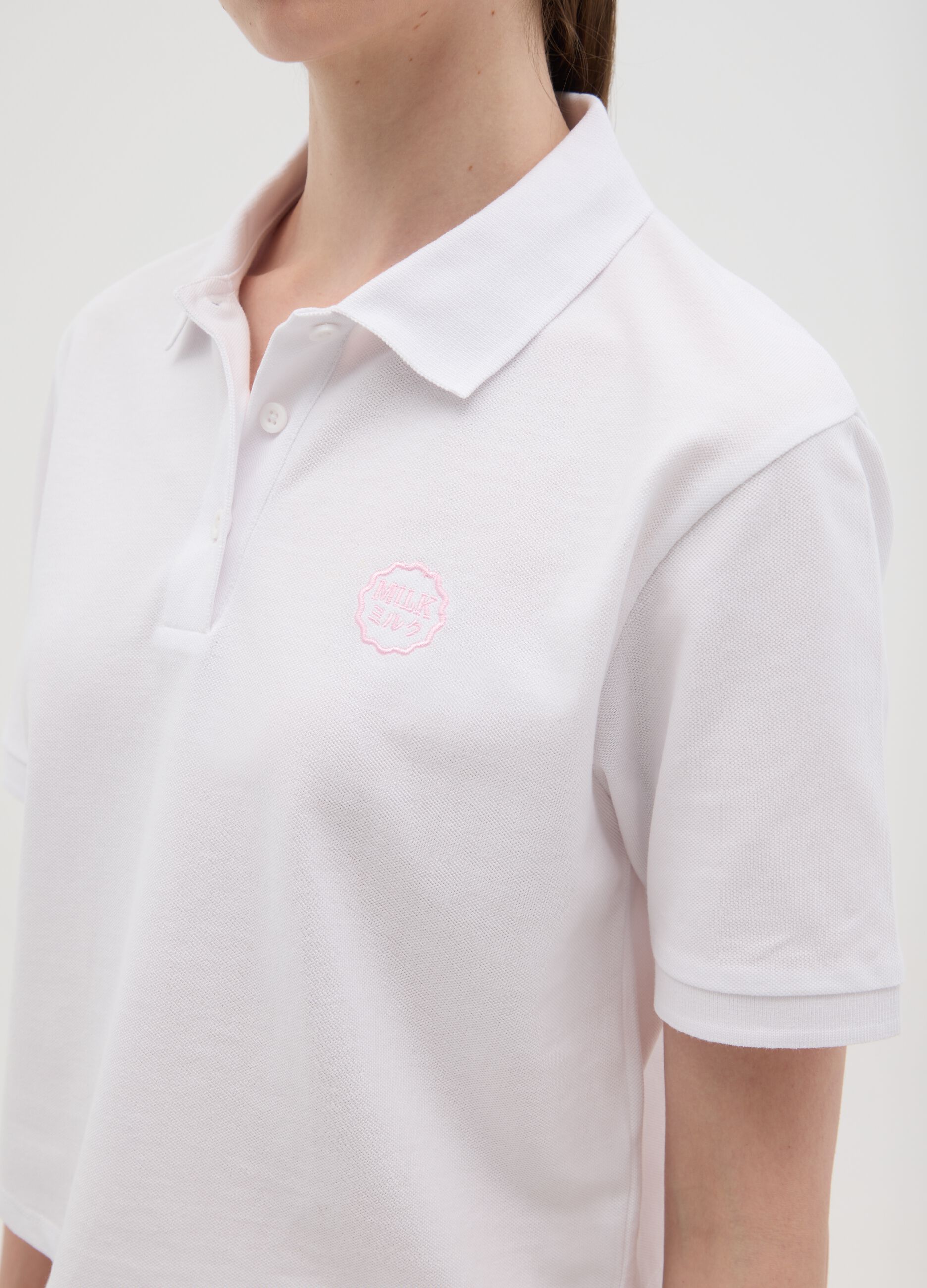 Women's pure white cotton polo, regular fit with classic collar and embroidered logo
