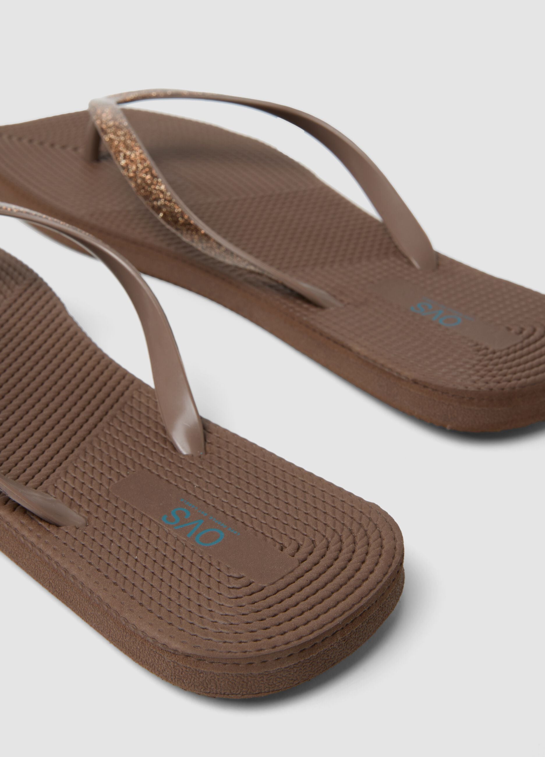 Brown flip-flops with glitter straps