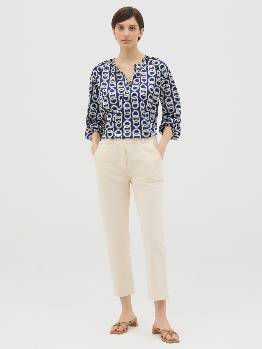 Blue long-sleeved blouse with geometric print_1