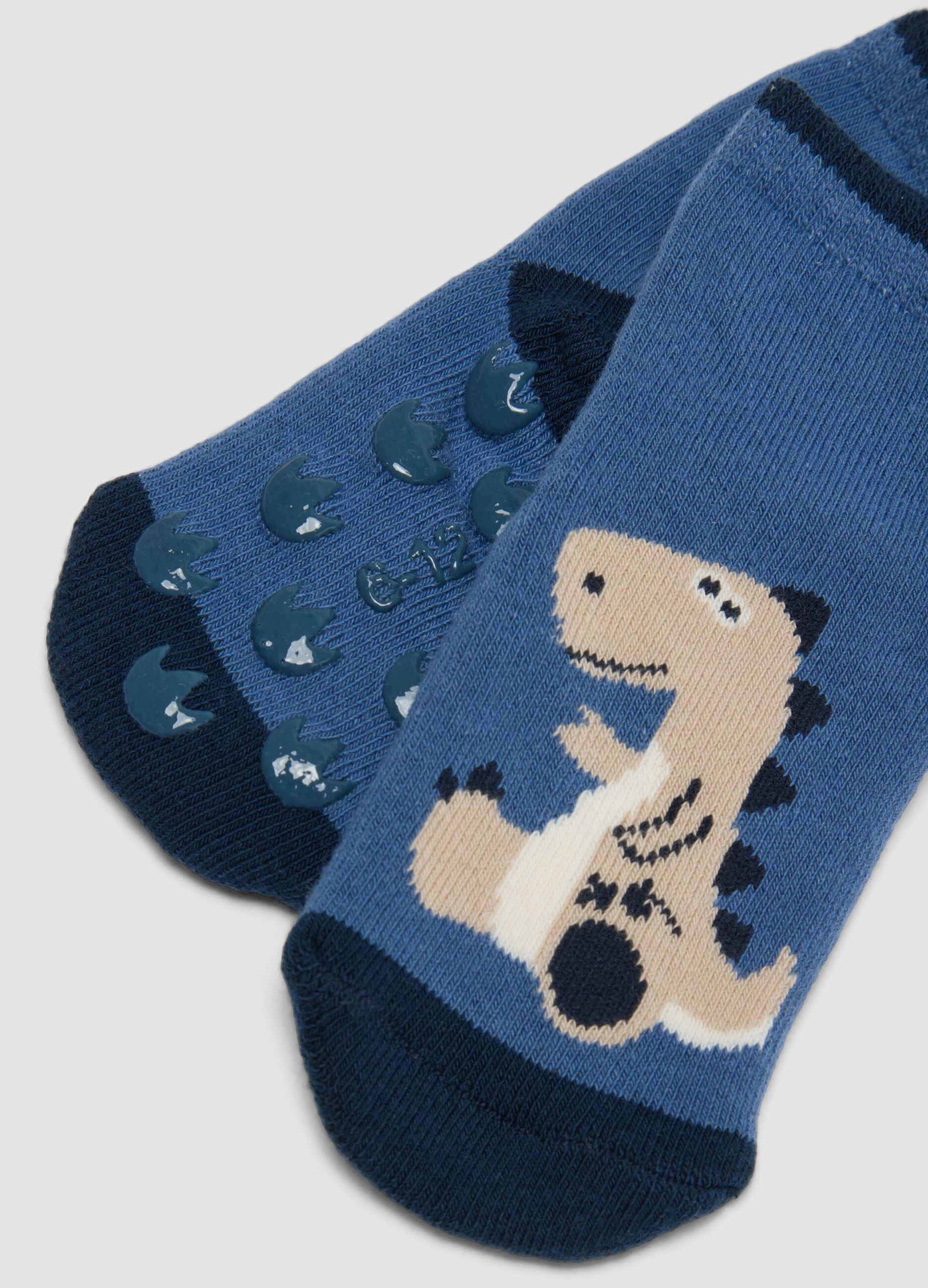 2-pack of blue non-slip socks in organic stretch cotton with dinosaur print