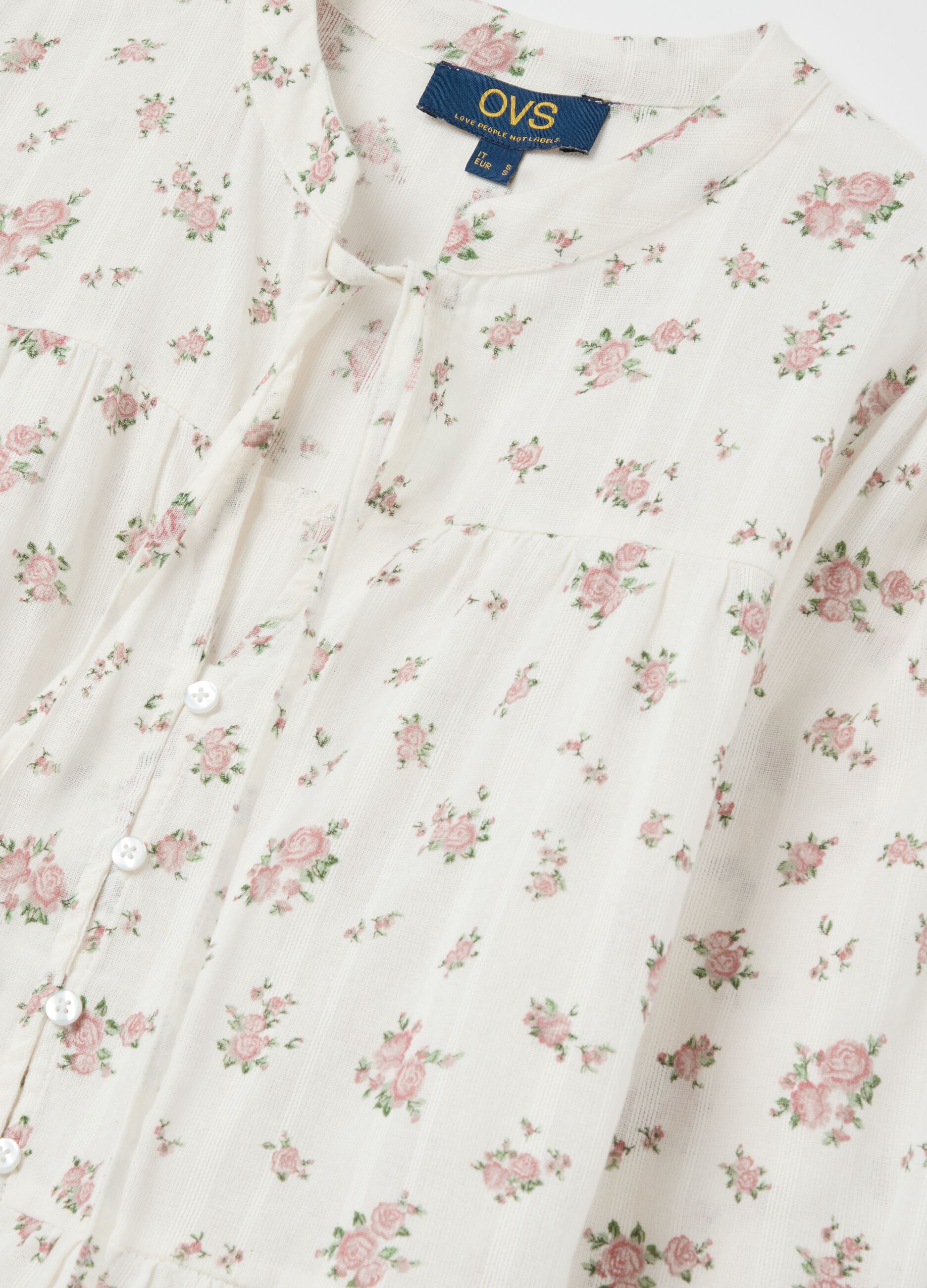 Blouse with laces and striped motif
