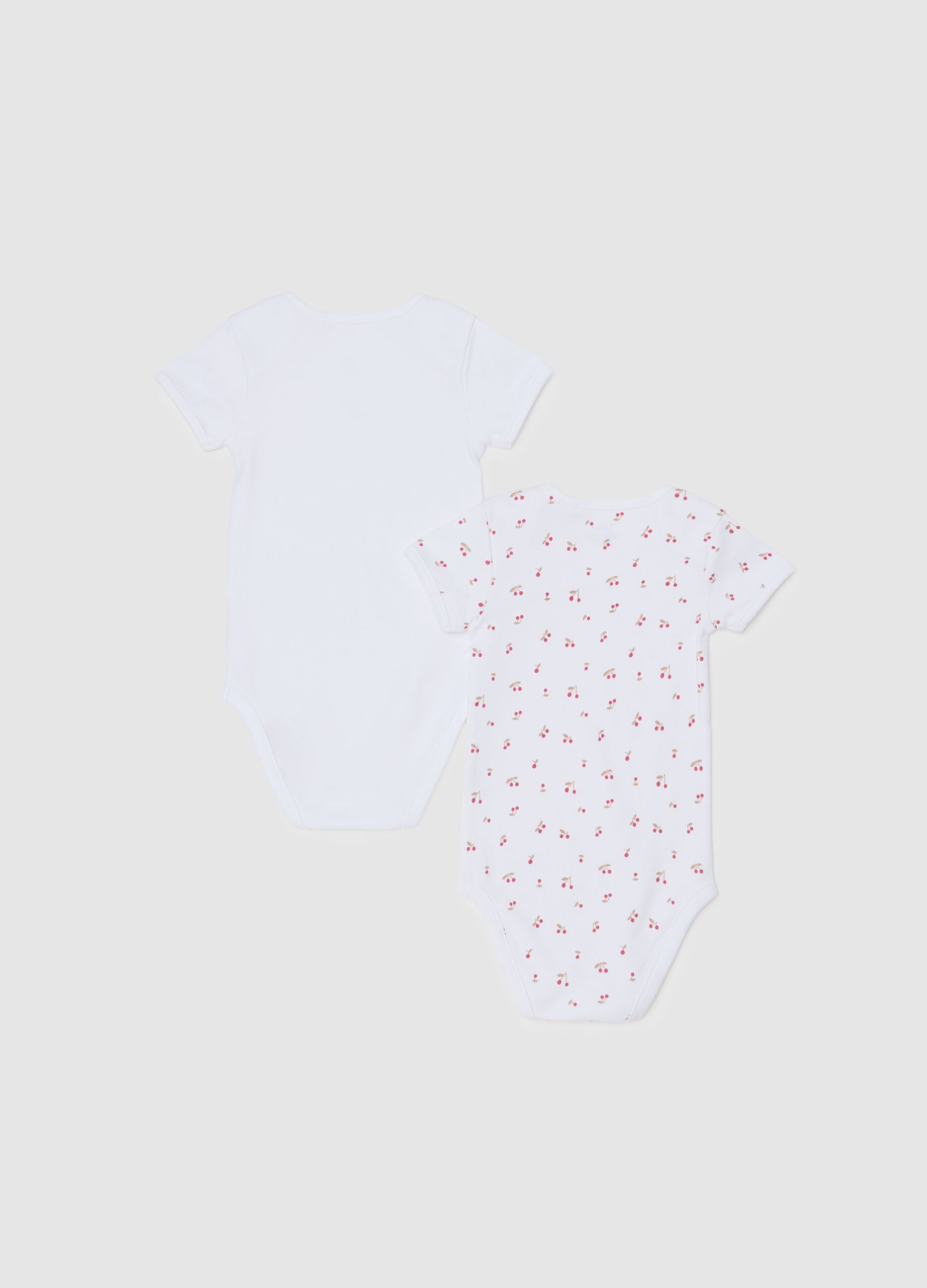 Set of two white pure cotton bodysuits for baby girls