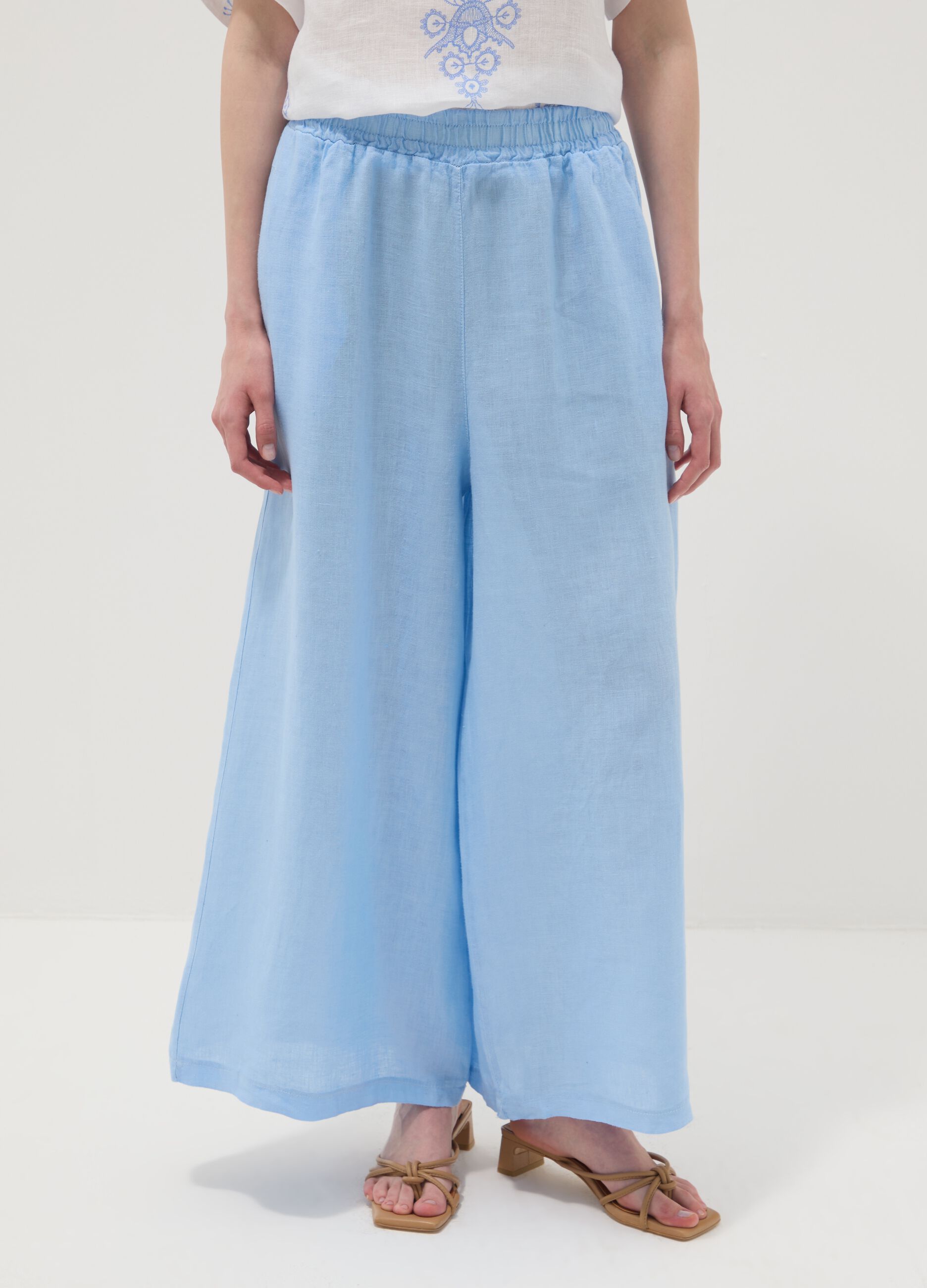 Light blue pure linen wide-leg trousers with a regular fit