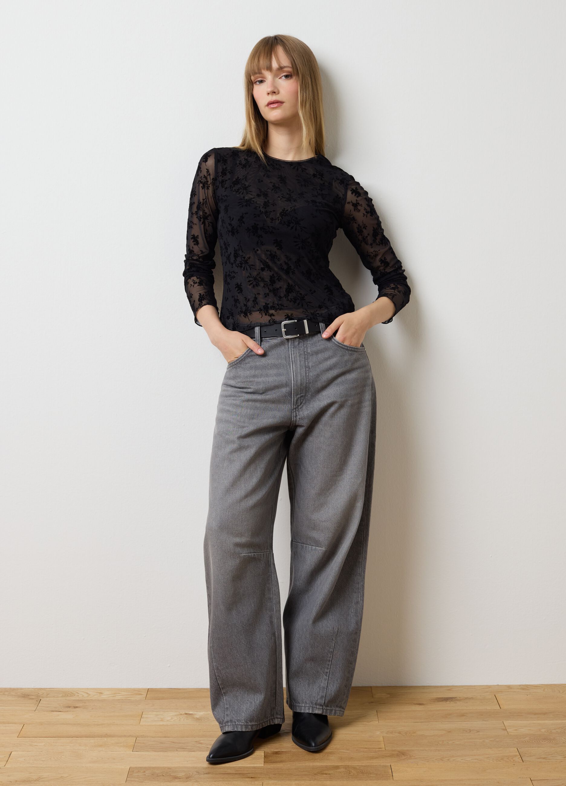 Transparent black t-shirt with floral patterns