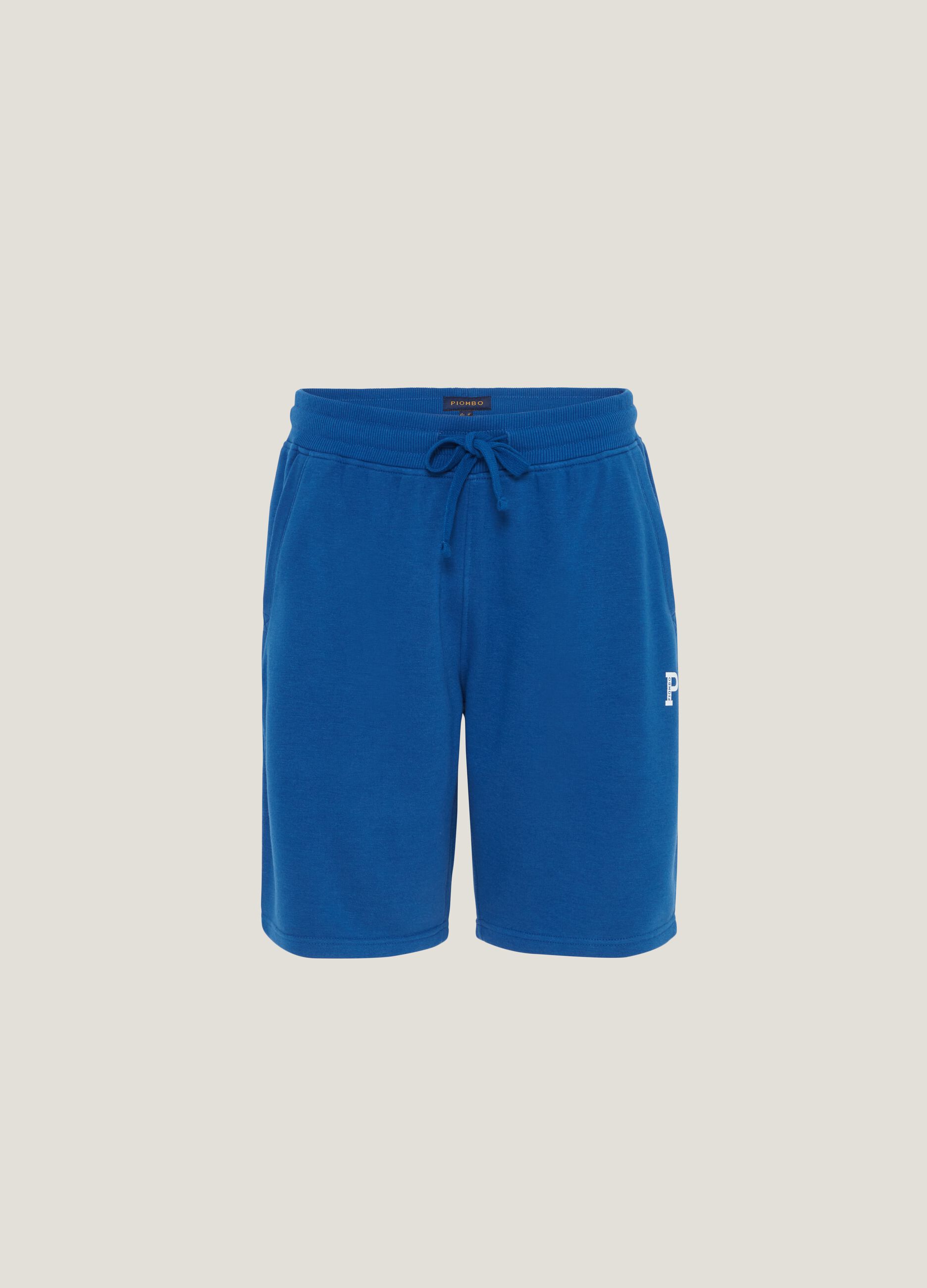 Fleece Bermuda shorts with print