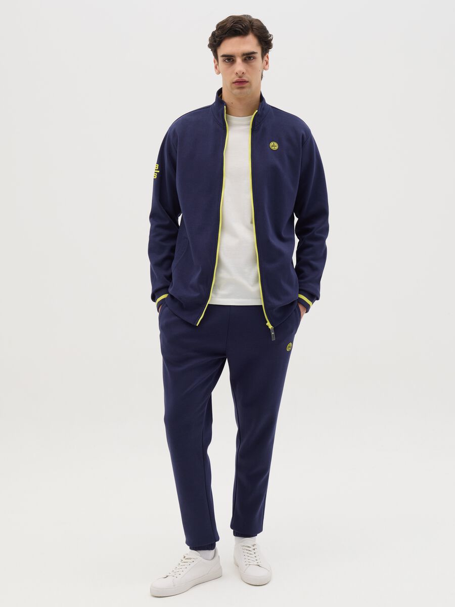 Blue full-zip sweatshirt with yellow details and logo_1
