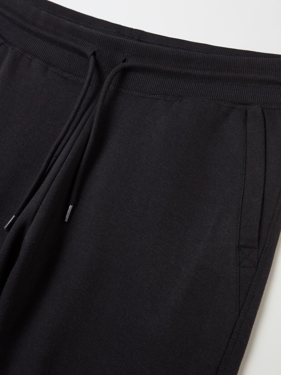 Fleece joggers with pockets and drawstring_5
