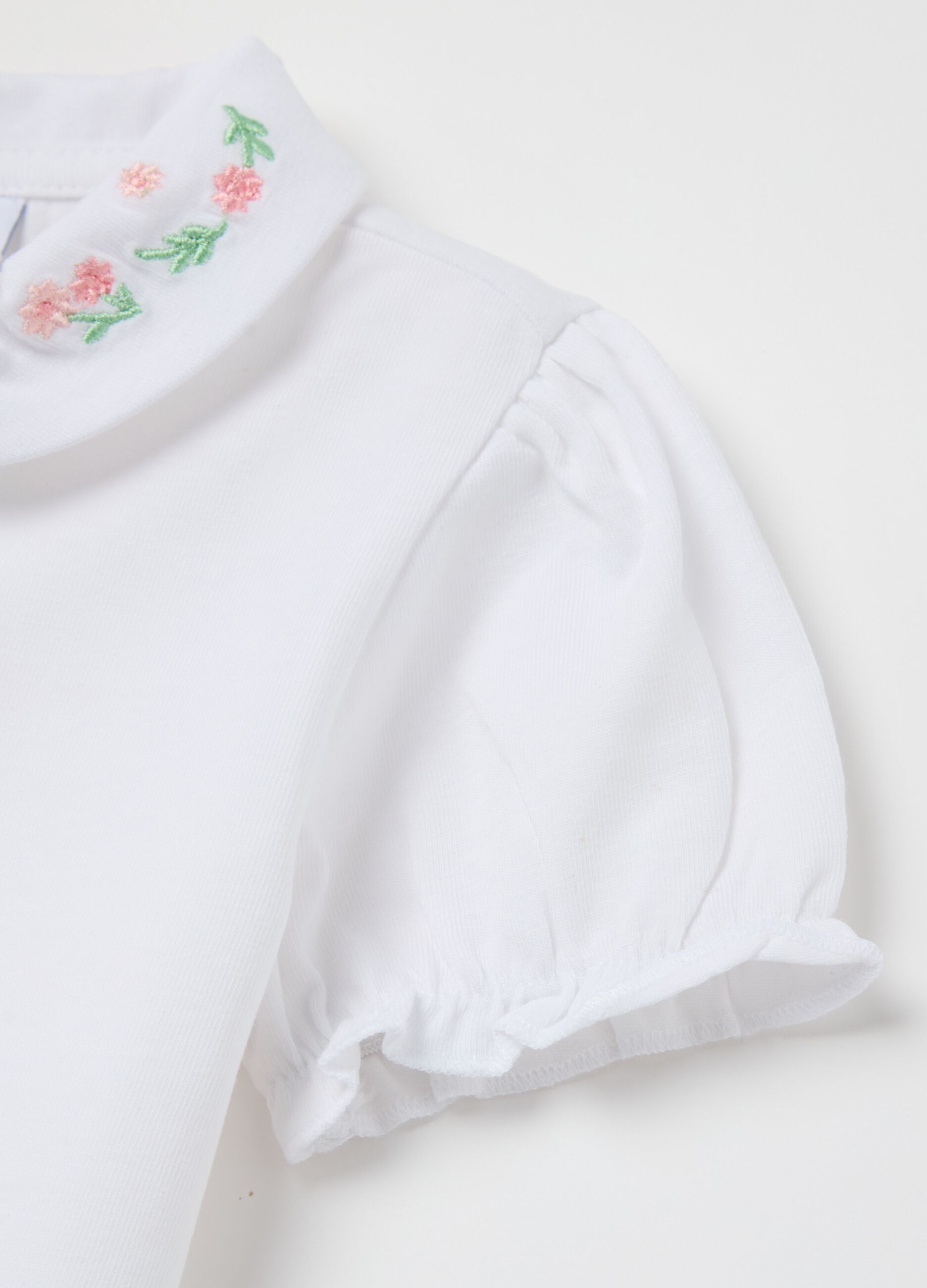 Stretch cotton polo shirt with flowers embroidery