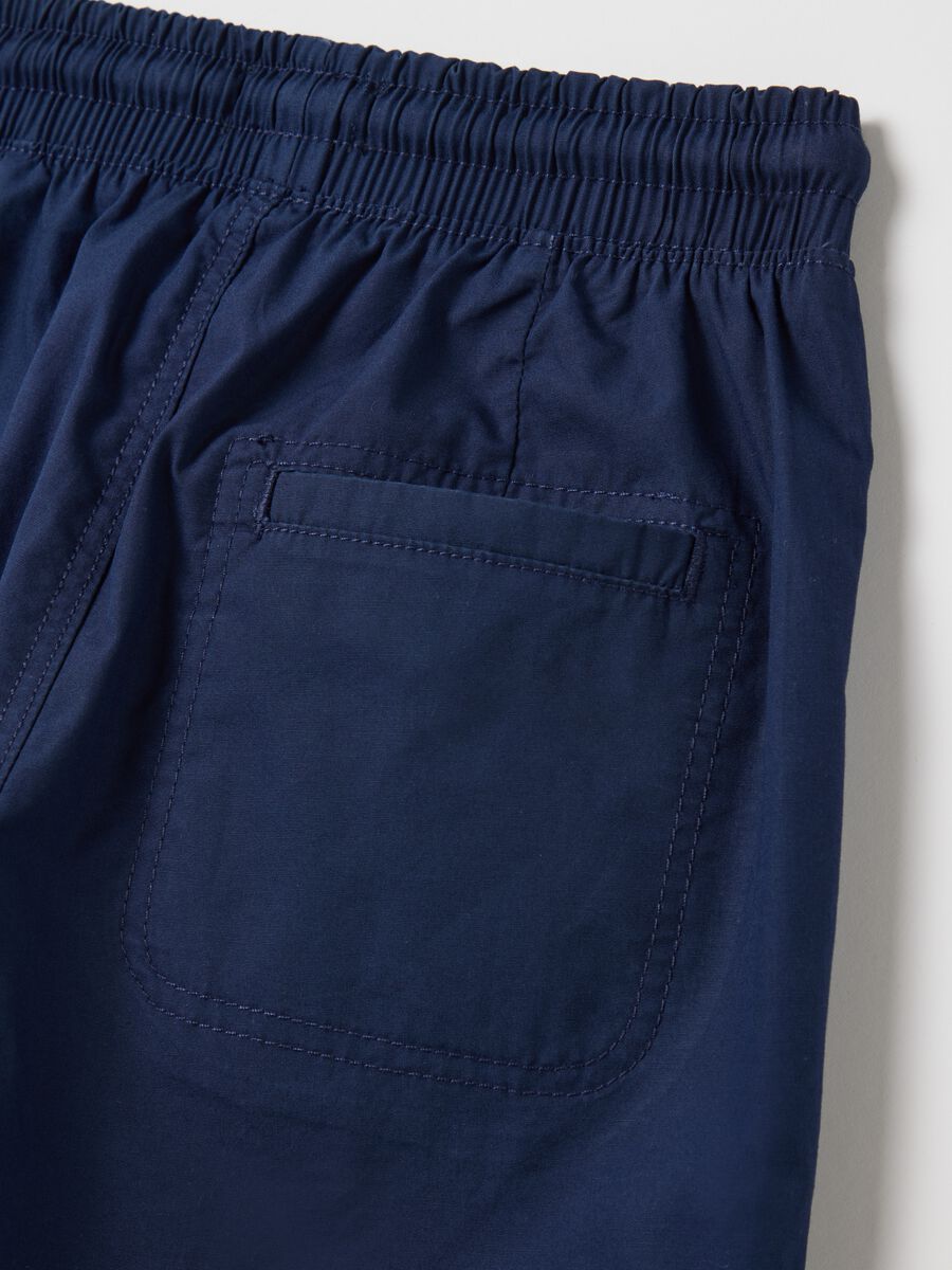 Blue boys’ shorts in 100% cotton with regular fit and  elasticated waist_2