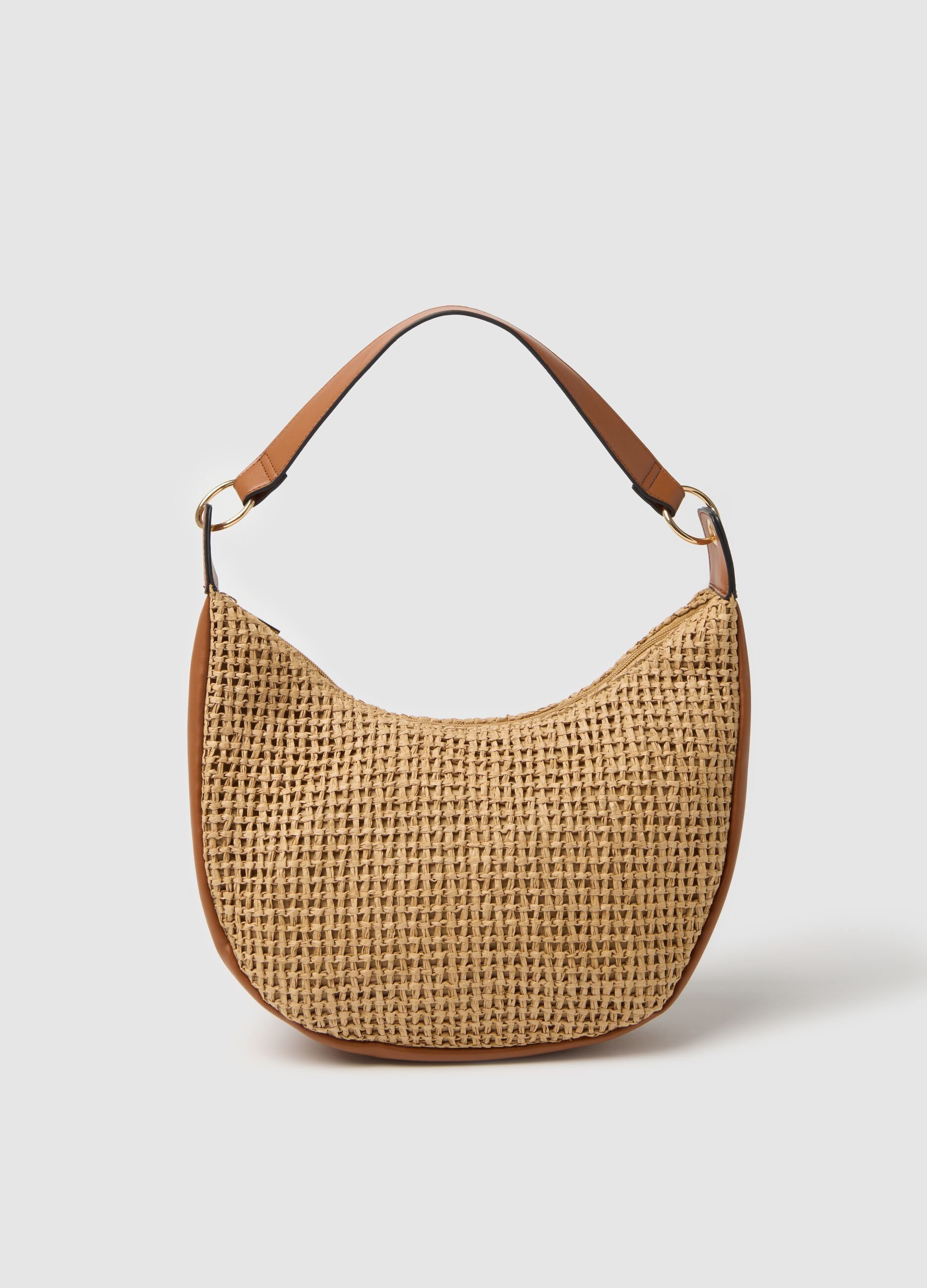Crossbody bag in woven straw