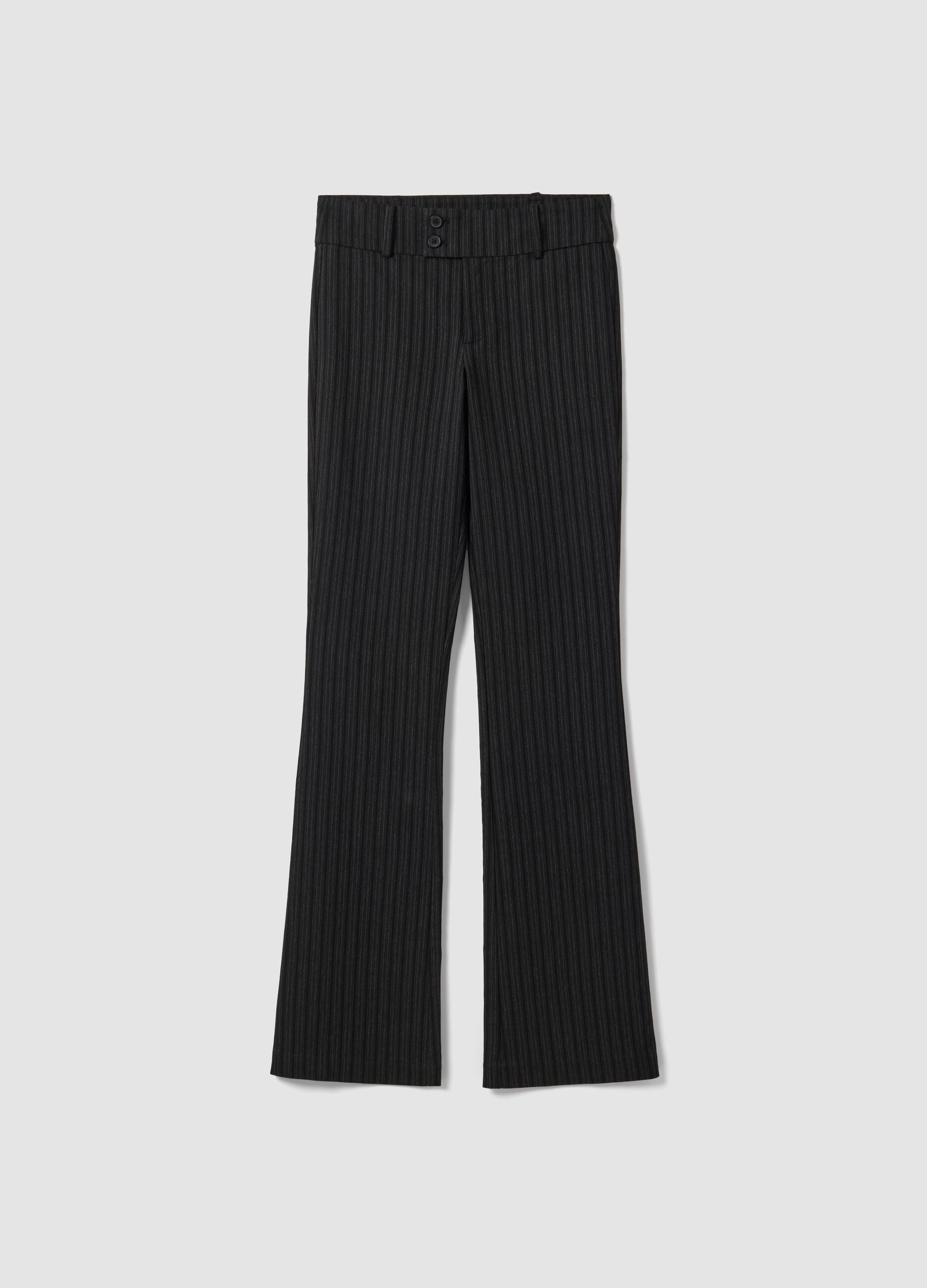 Pantaloni neri flare in viscosa elasticizzato con fantasia gessata