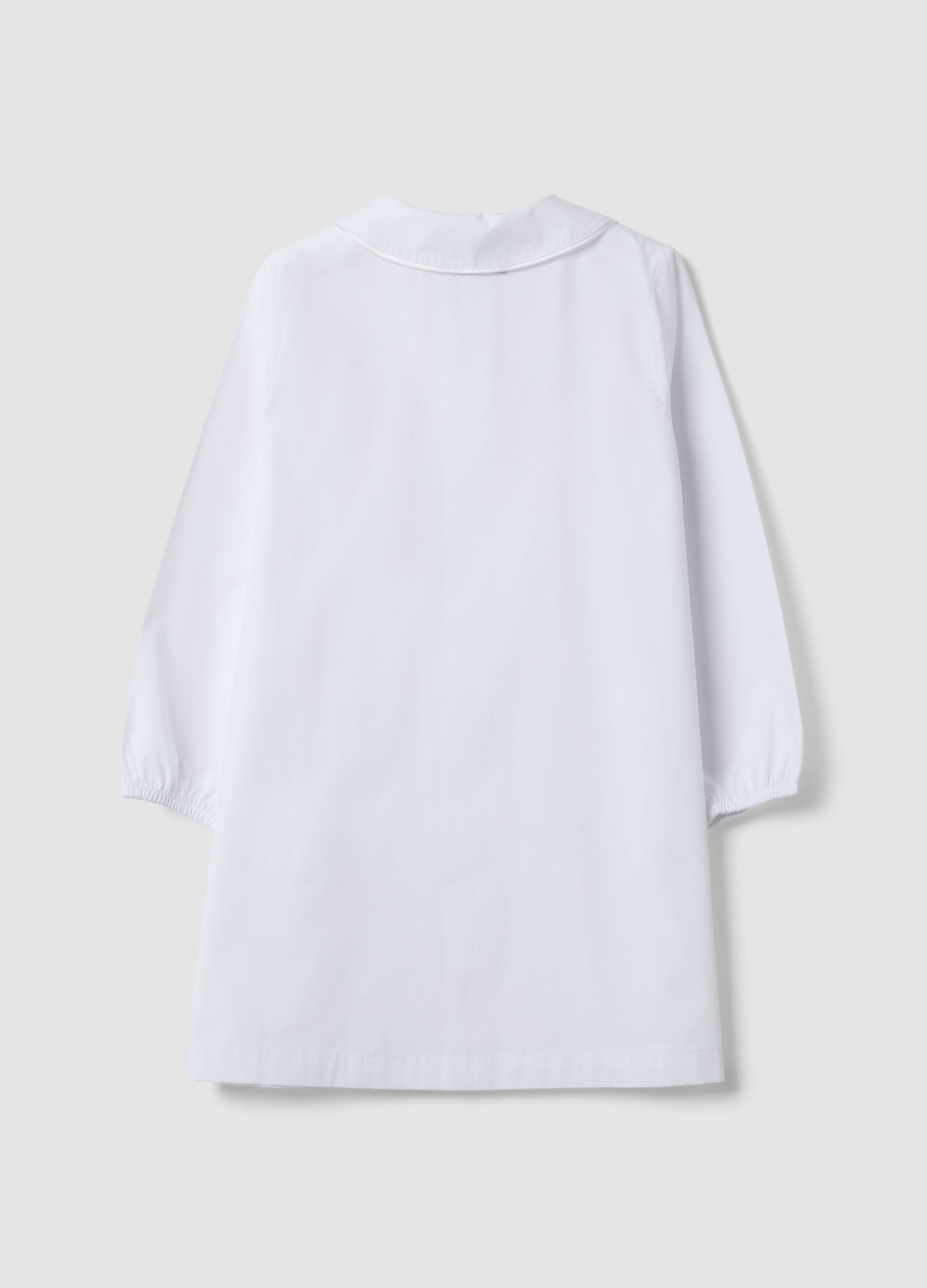 Girls&rsquo; white school apron with zip fastening and classic collar