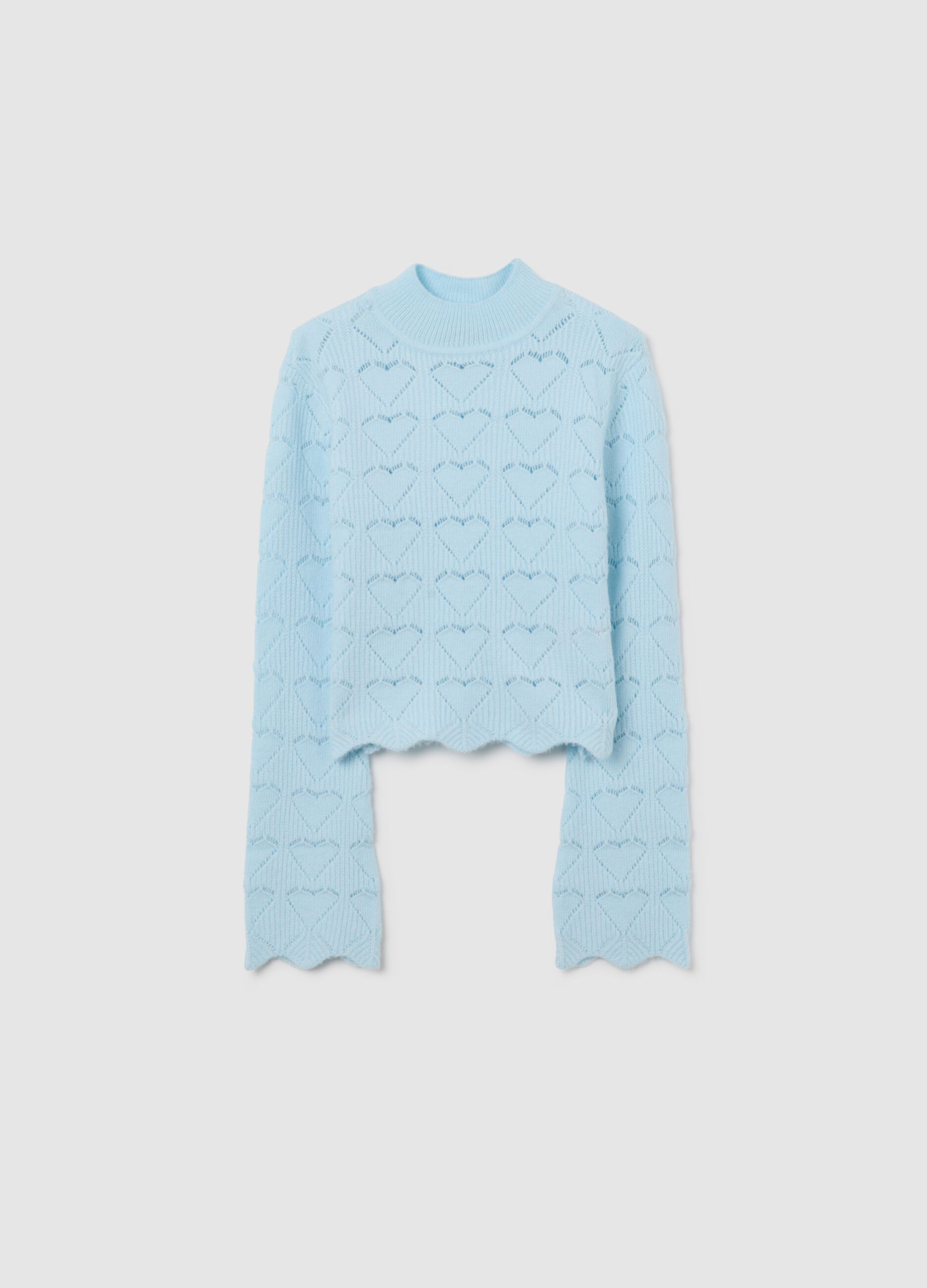 Blue sweater with heart design