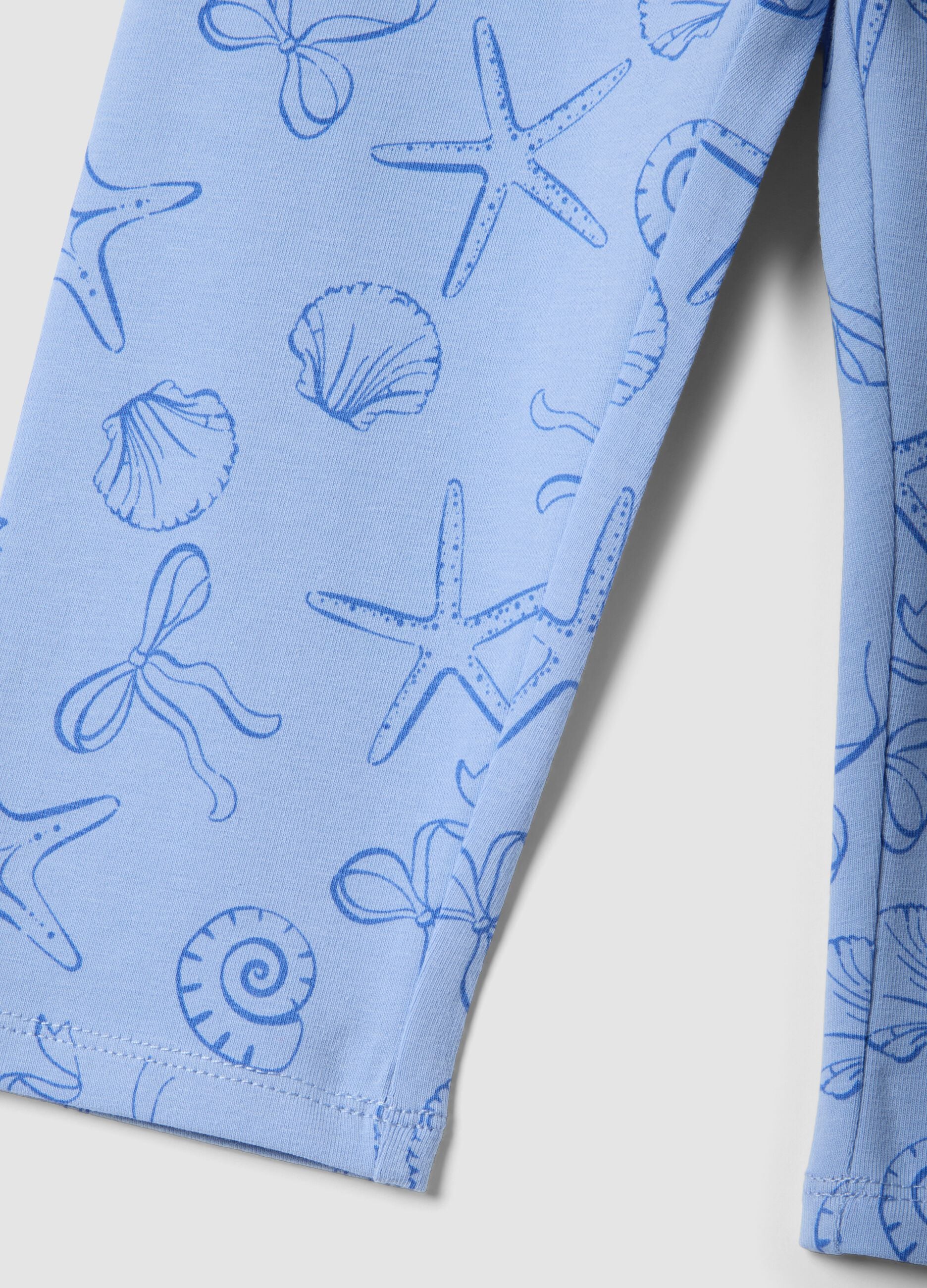 Leggings skinny azzurri in cotone elasticizzato da bambina con stampe