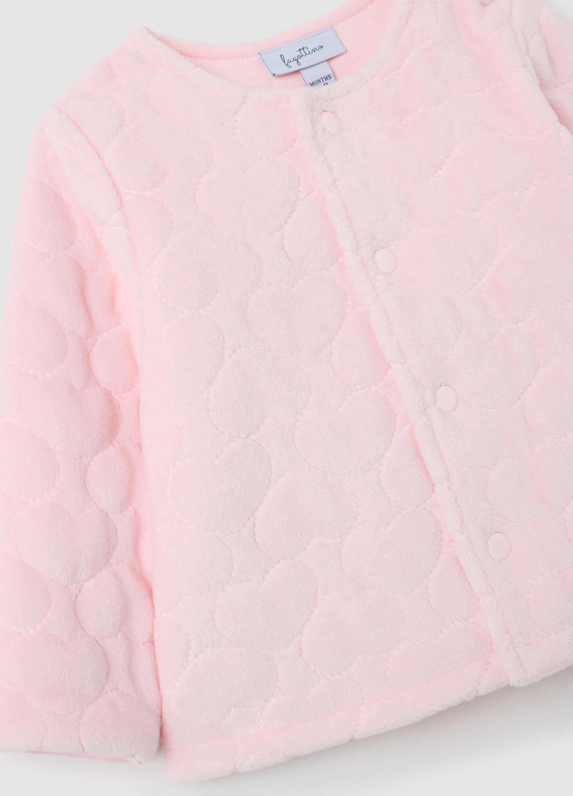 Pink cotton baby jacket with snap closure