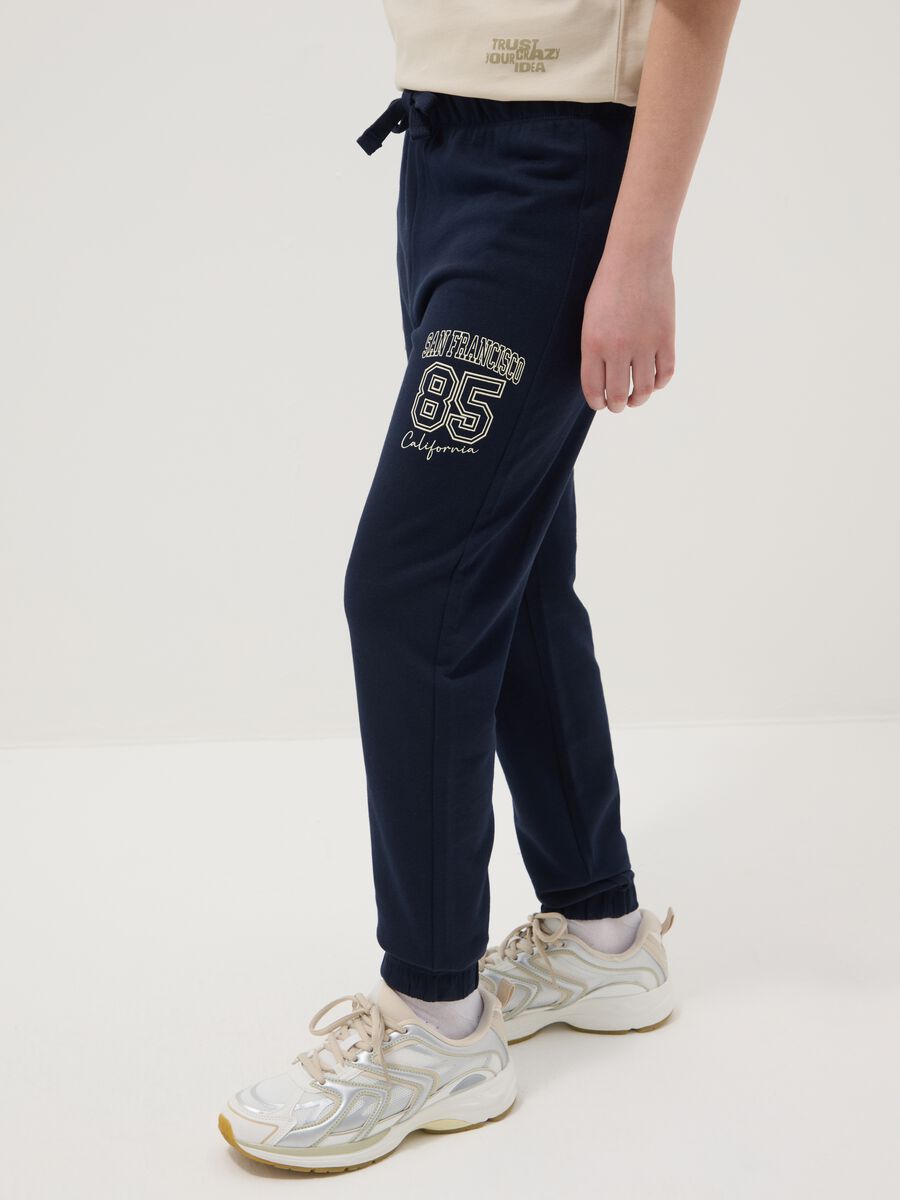 Pantaloni jogger blu in misto cotone e viscosa da ragazzo regular fit_1