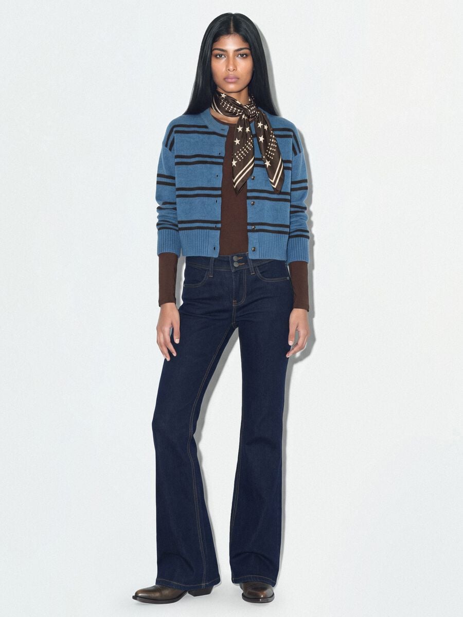 Jeans blu flare in cotone elasticizzato_1