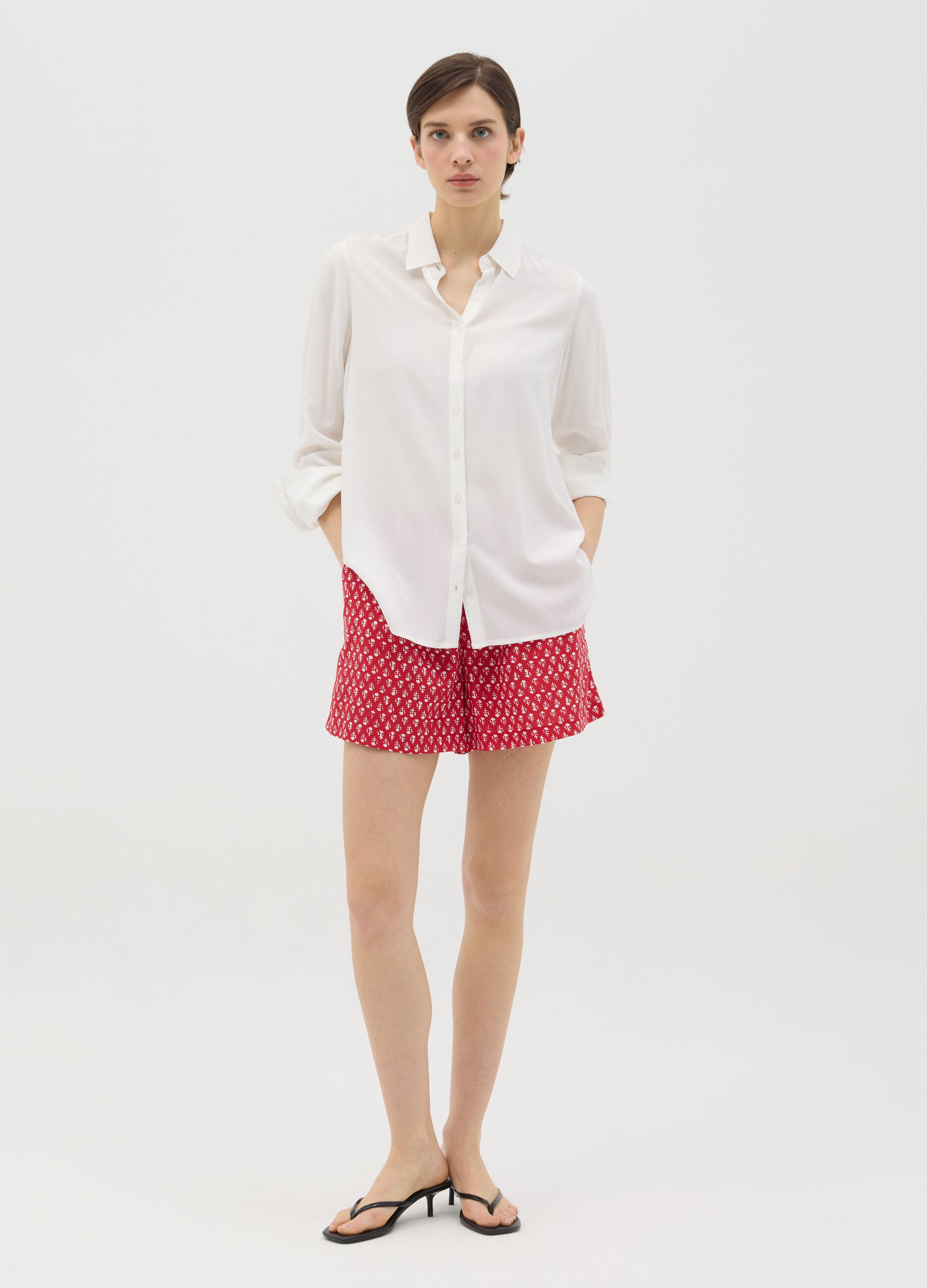 Red viscose shorts with ethnic pattern