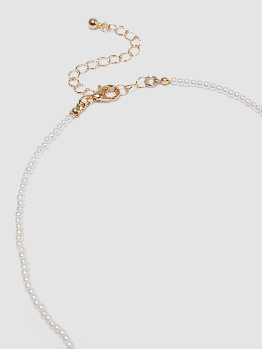 Double-strand beaded necklace with charms_1