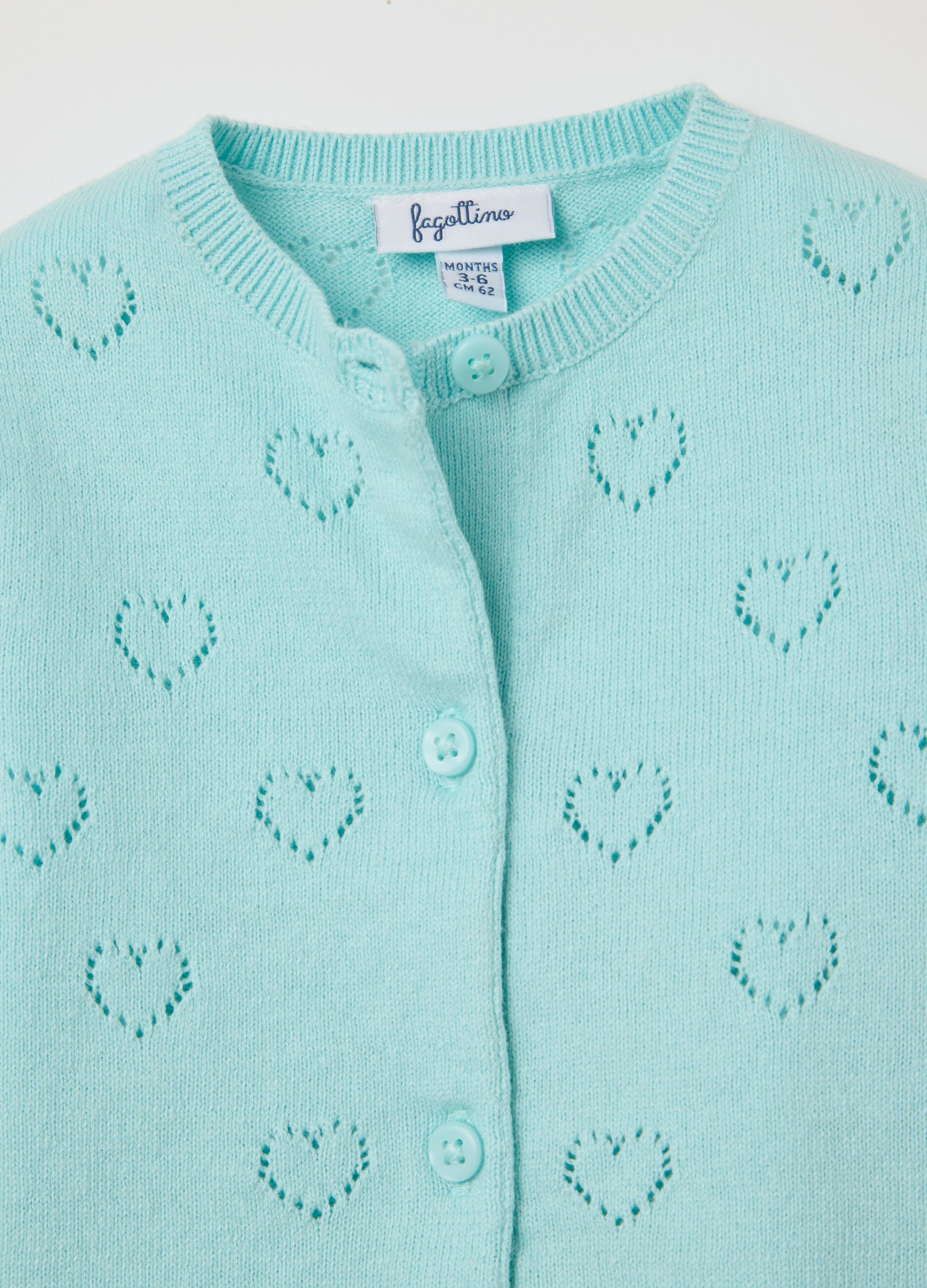 Cardigan azzurro con motivo a cuori traforato