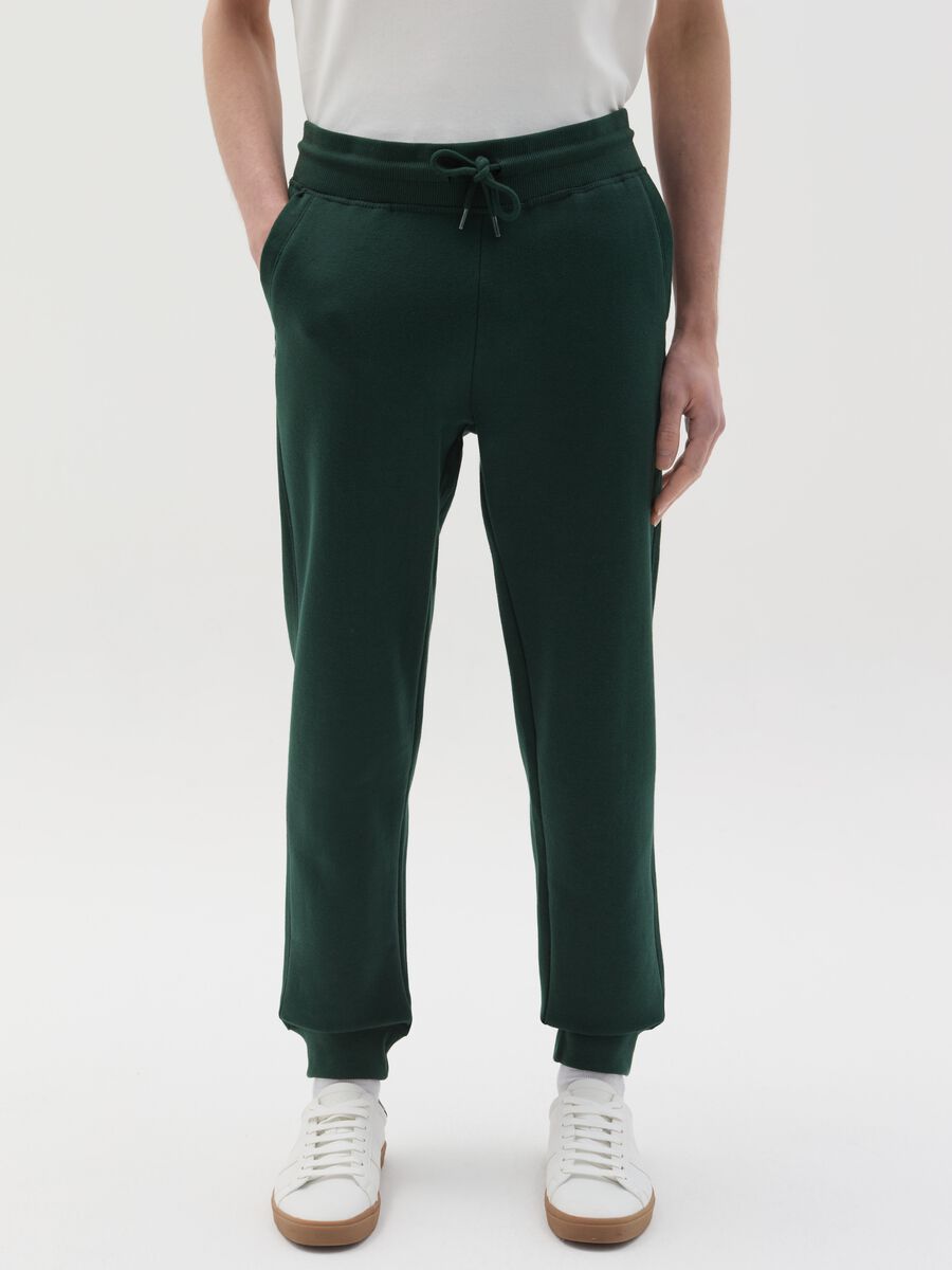 Fleece joggers with pockets and drawstring_1