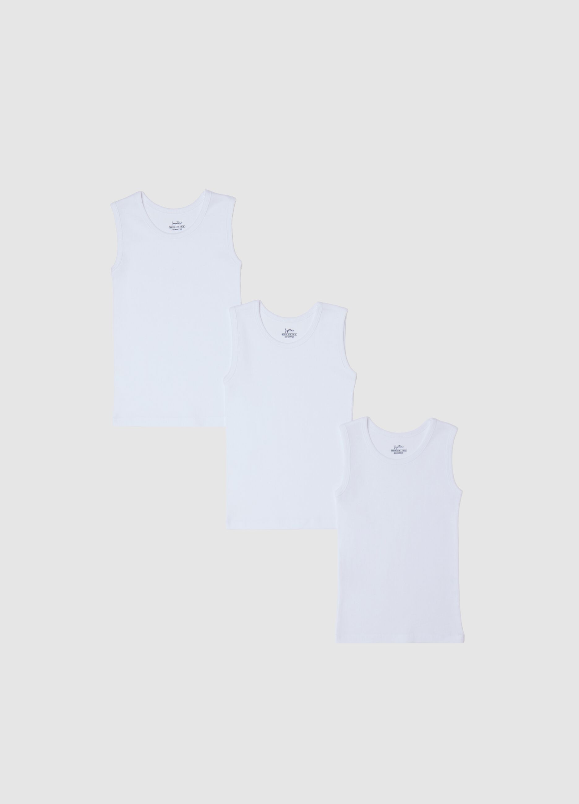 Three-pack white racerback vests in organic cotton