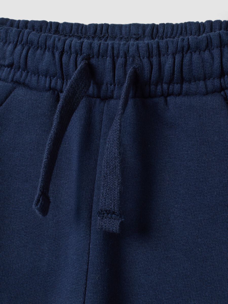 Pantaloni jogger blu notte in puro cotone over fit con stampa animaletto_2