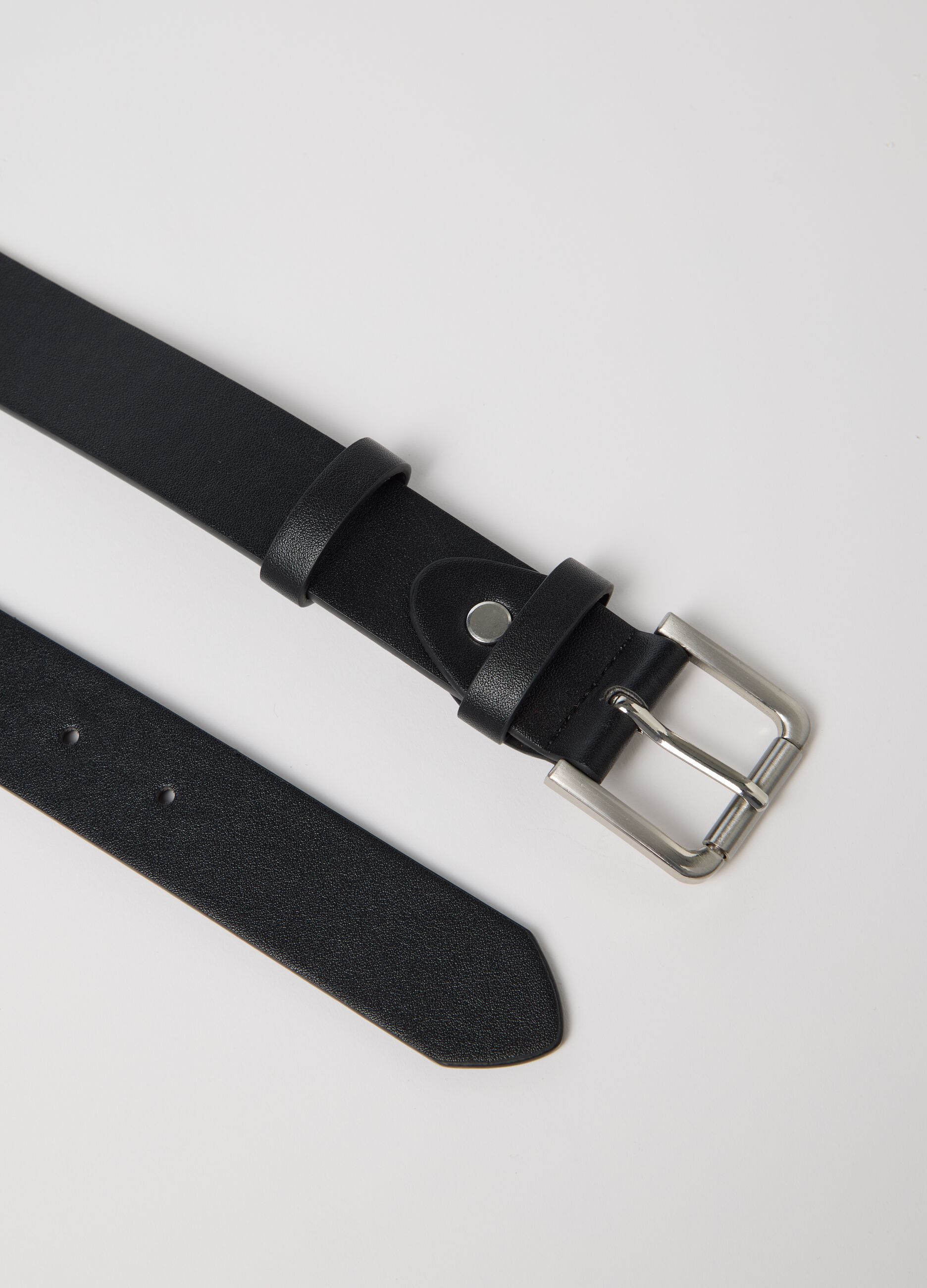 Black belt with rounded metal buckle