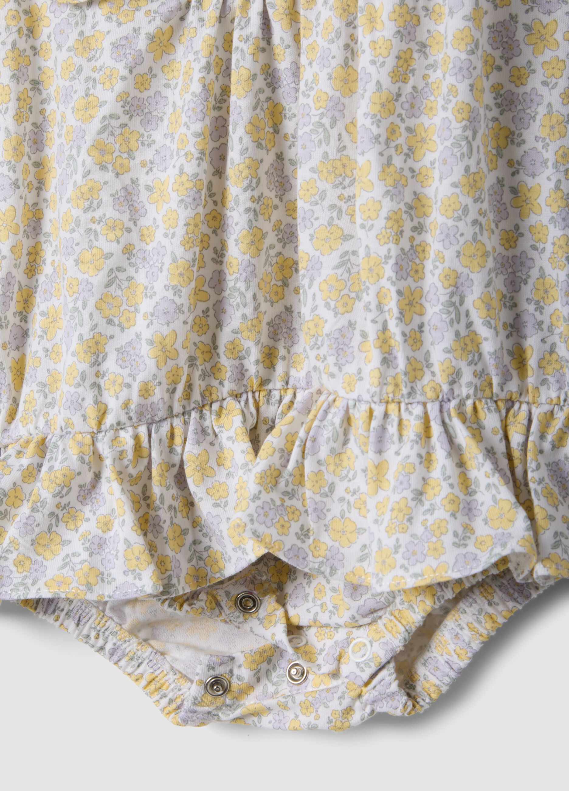 Yellow pure cotton baby girl romper with ruffles and floral print
