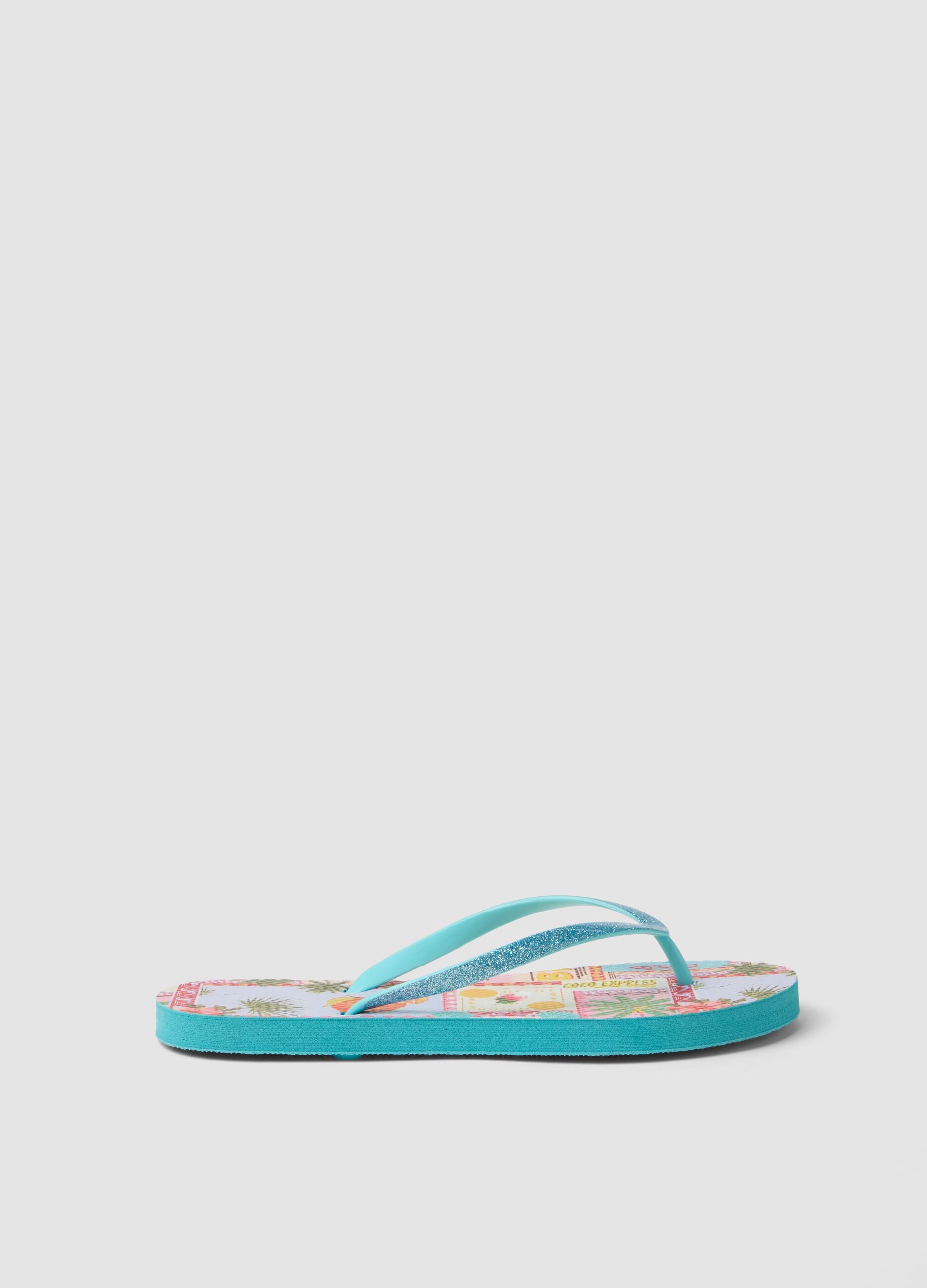 Blue multicolour tropical print flip-flops
