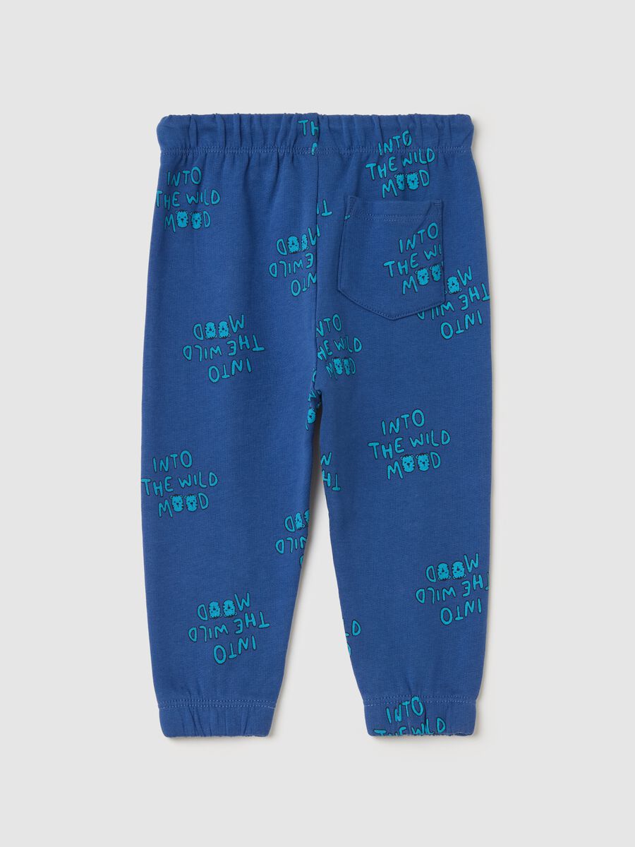 Joggers with elasticated trims and "Into the wild mood” print_1