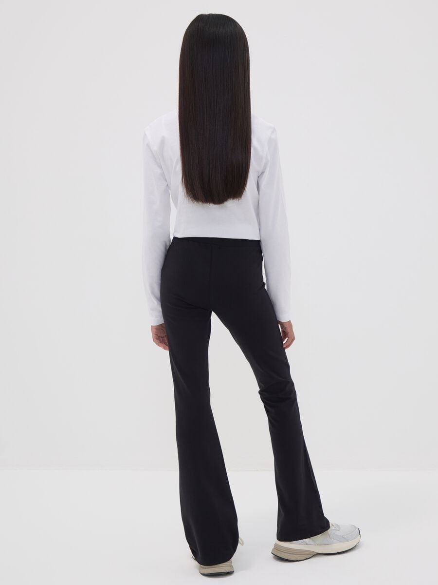 Leggings neri flare in cotone organico elasticizzato per ragazza_1