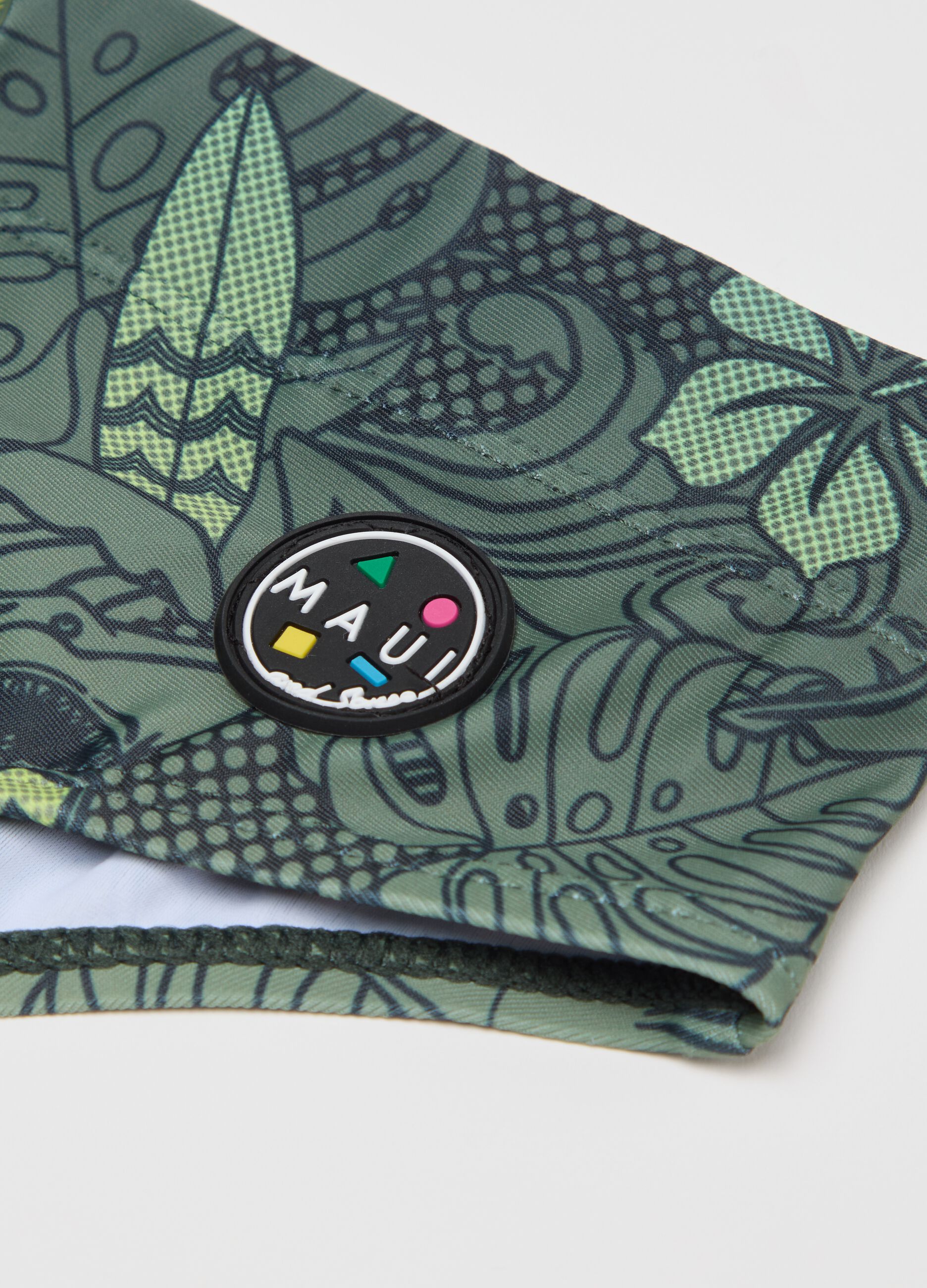 Swim briefs with foliage print