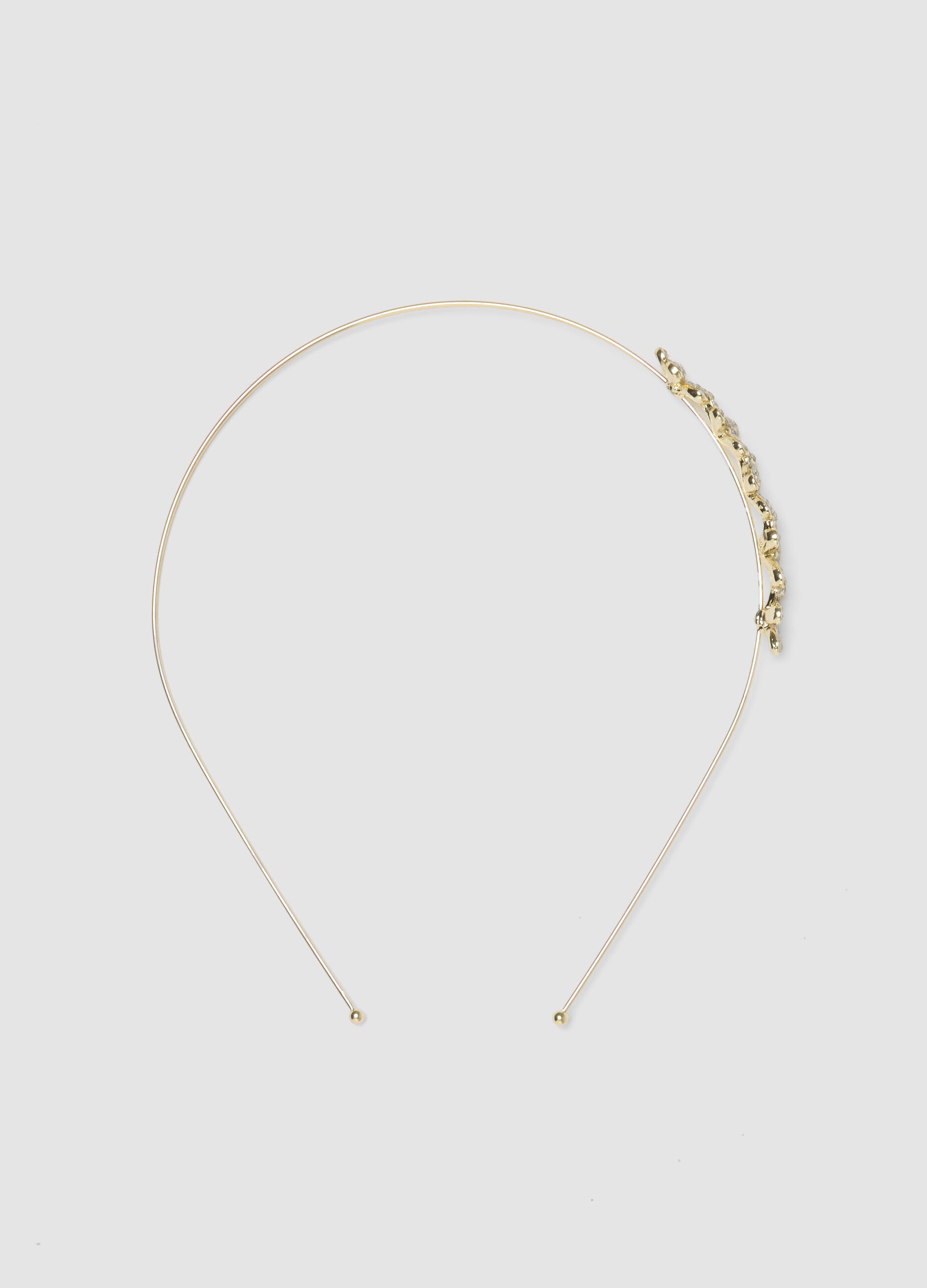 Golden girl's headband with floral decoration