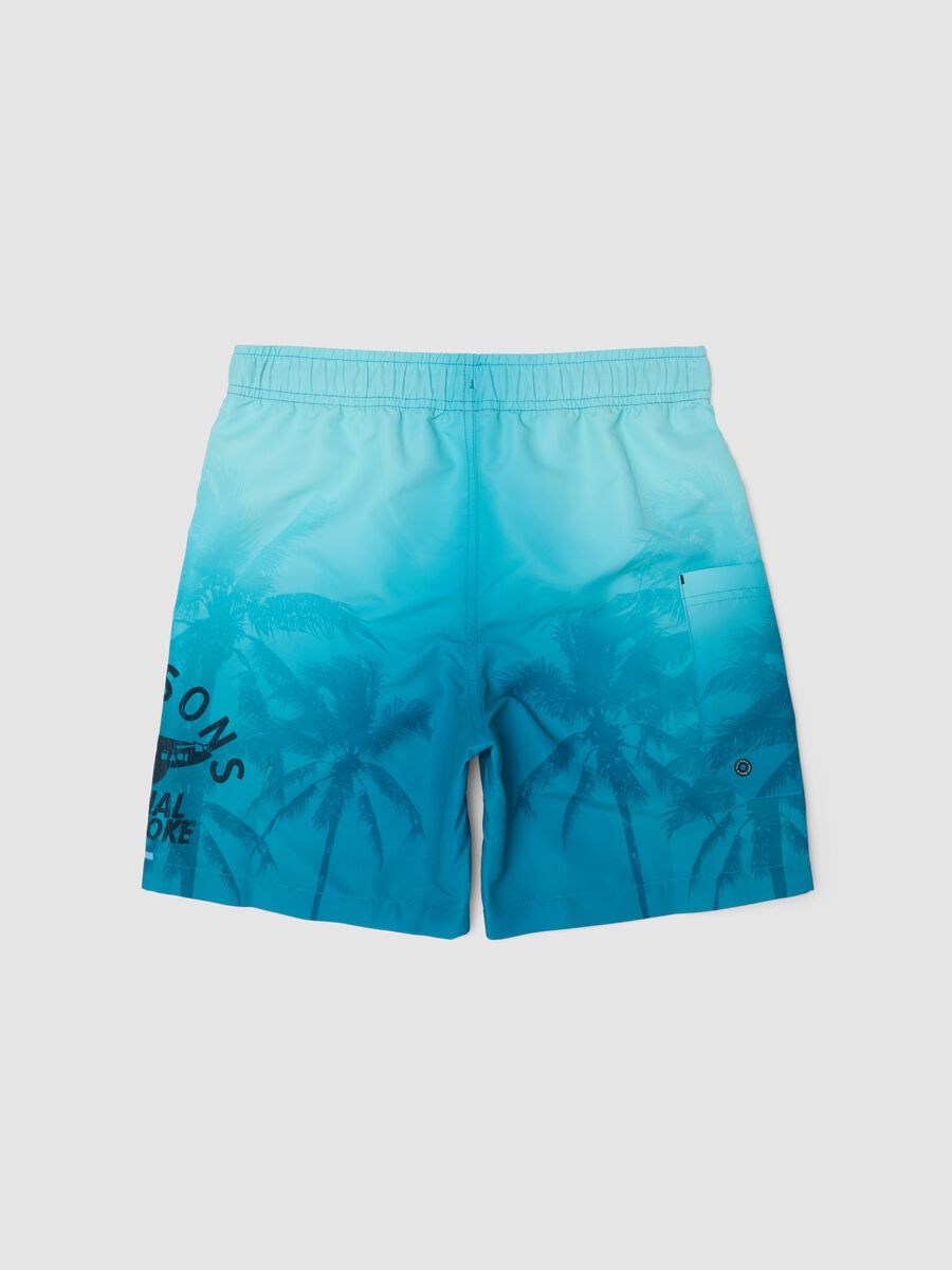Blue tropical-print swim shorts_1