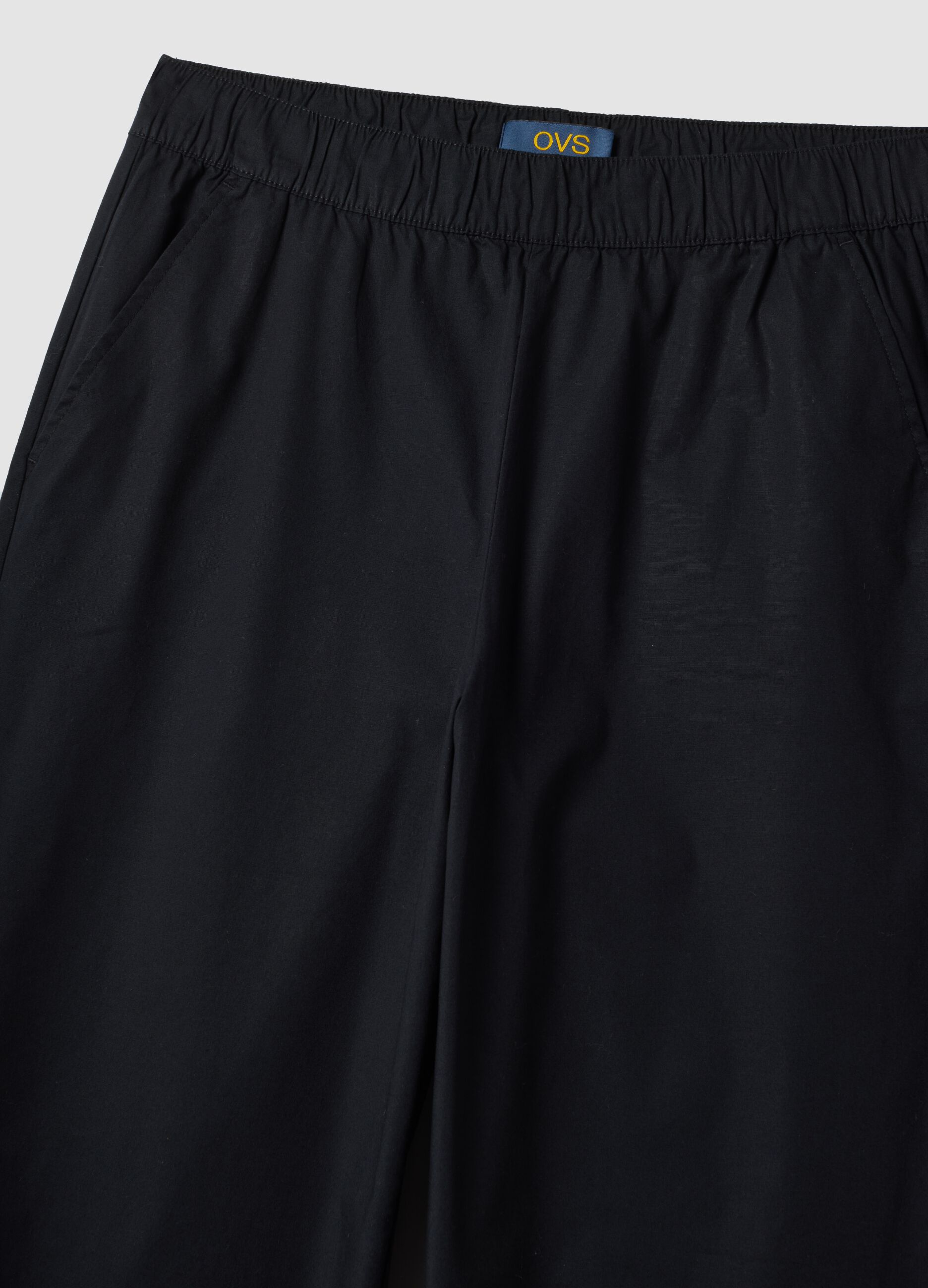 Blue stretch cotton trousers with elasticated waistband